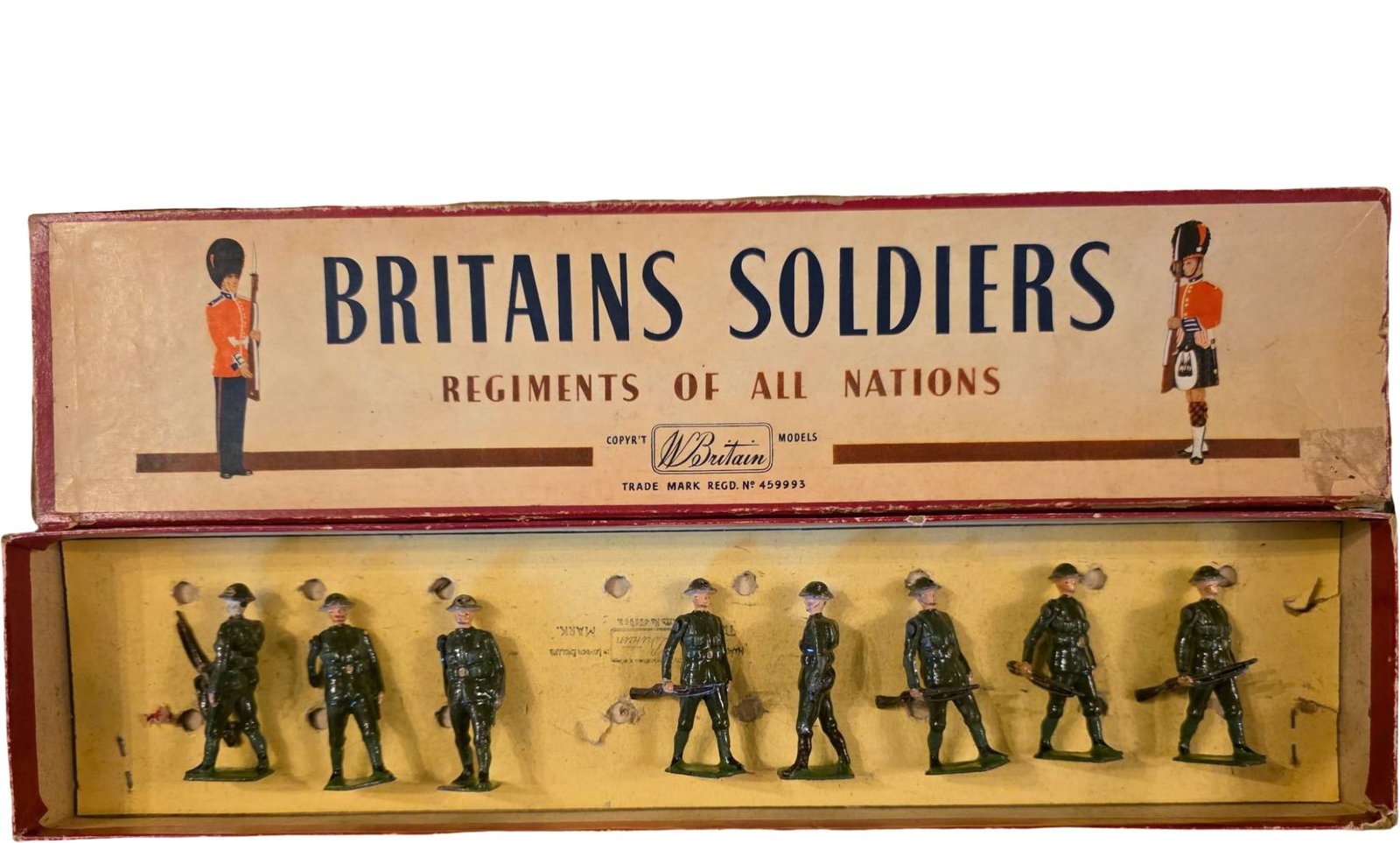 Britains Soldiers ‘Regiments of All Nations’ Boxed Set with 8 Lead Figures: Eight hand-painted lead soldiers in ‘Regiments of All Nations’ series by Britains Ltd. Original box displays brand logo and description. Soldiers feature World War I-style uniforms, one with a rif