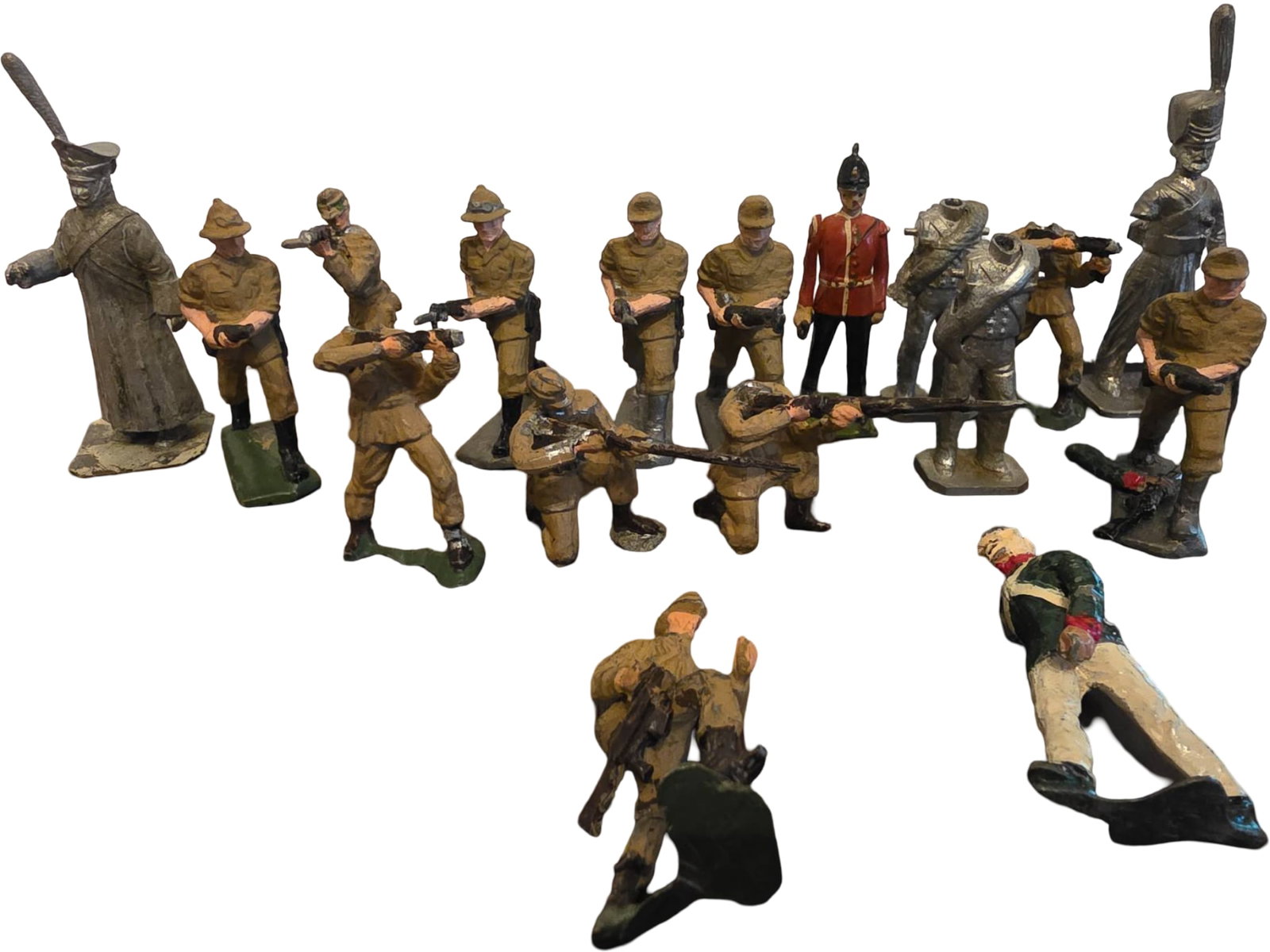 Seventeen Metal and Lead Toy Soldiers and Military Figures: 17 Painted metal and lead toy soldiers and military figures in various poses and uniforms. Includes approximately 15 pieces, some showcasing British colonial and military attire, with a mix of