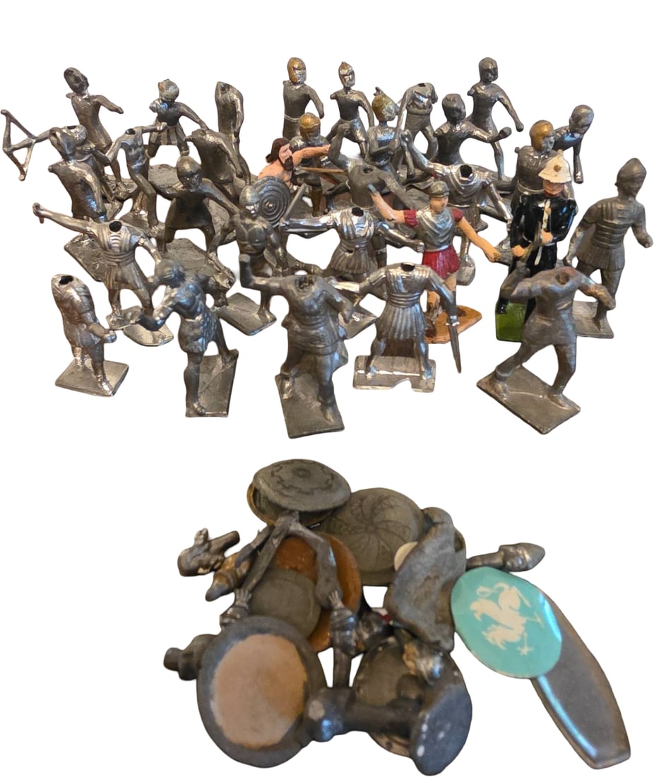 Thirty Metal Toy Soldiers and Figures in Varied Poses: Metal toy soldiers and figures, approximately 30 standing pieces with various historical and military-themed designs and poses. Includes knights, modern soldiers, and uniformed figures. An additional