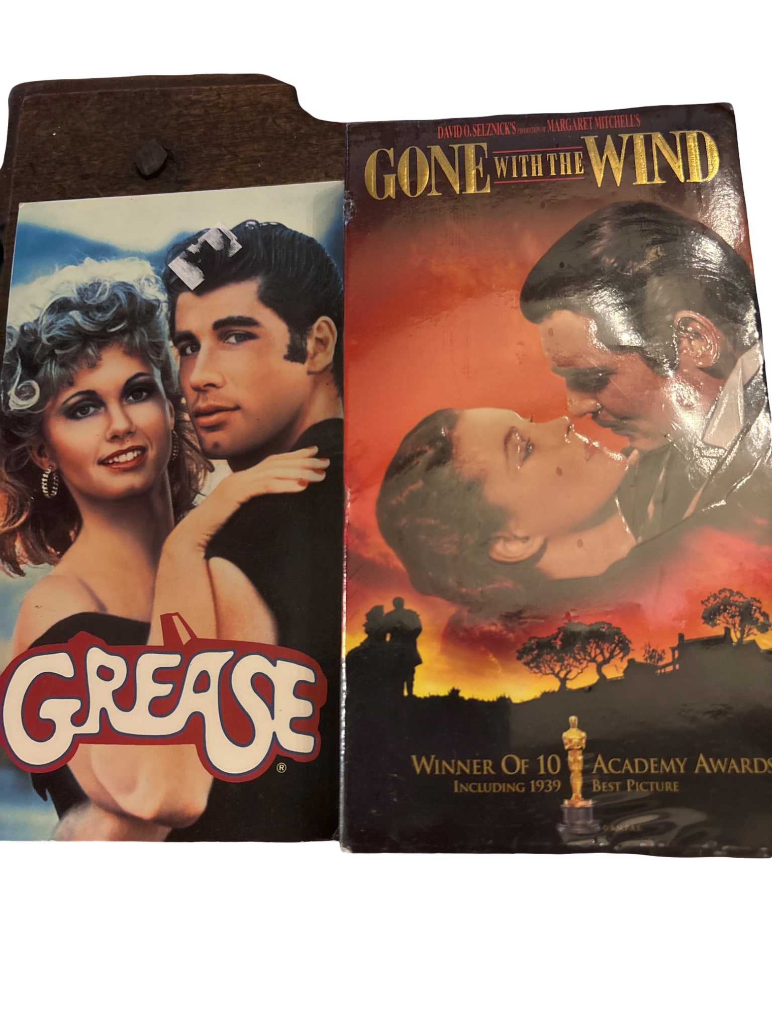 VHS Copies of ‘Grease’ and ‘Gone with the Wind’: Two VHS tapes, including Paramount Pictures’ ‘Grease’ featuring the original cast and MGM’s ‘Gone with the Wind.’ Both tapes include original packaging with detailed synopses and