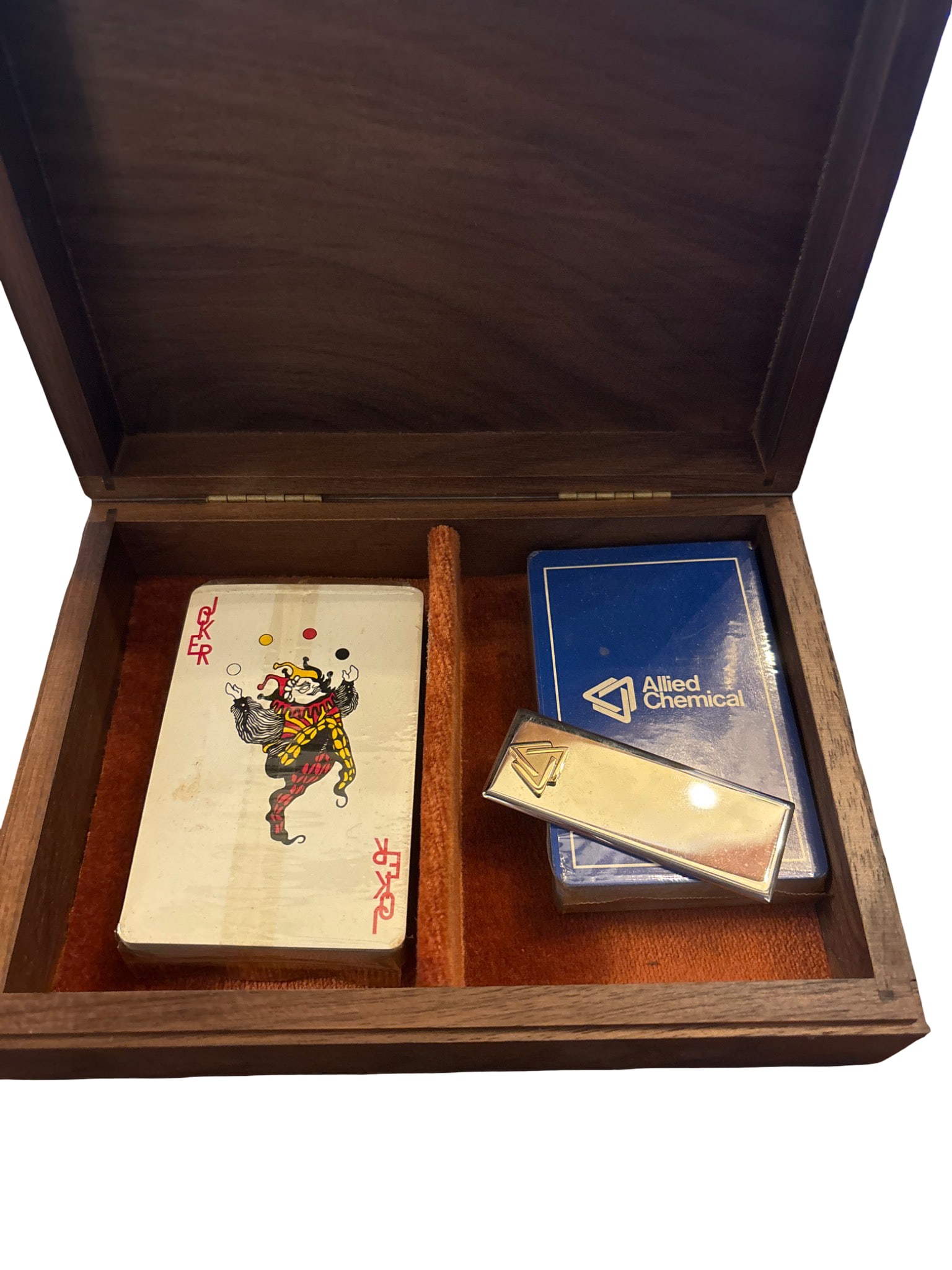 Decatur Industries Wooden Box with Playing Cards and Allied Chemical Card Case: Wooden box by Decatur Industries with a felt-lined interior. Includes two decks of playing cards: one featuring a Joker design, and a second set housed in an Allied Chemical-branded metal card case.
