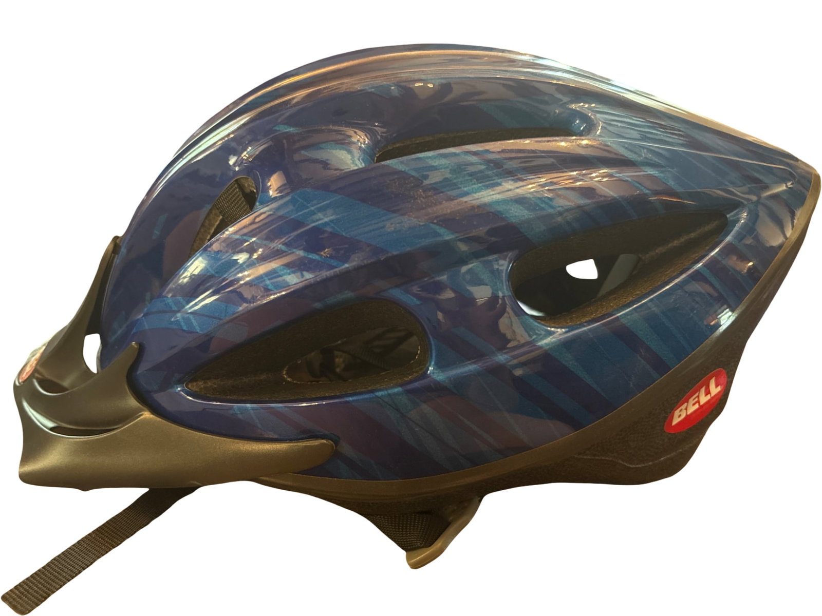 Bell Contrail Bicycle Helmet, Blue Pattern, Size M/L, Dated July 2001: Bell Contrail bicycle helmet featuring a blue patterned exterior and ventilation openings. Adjustable SmartFit strap system for customized fit. Inside padding intact. Size M/L, as labeled inside,