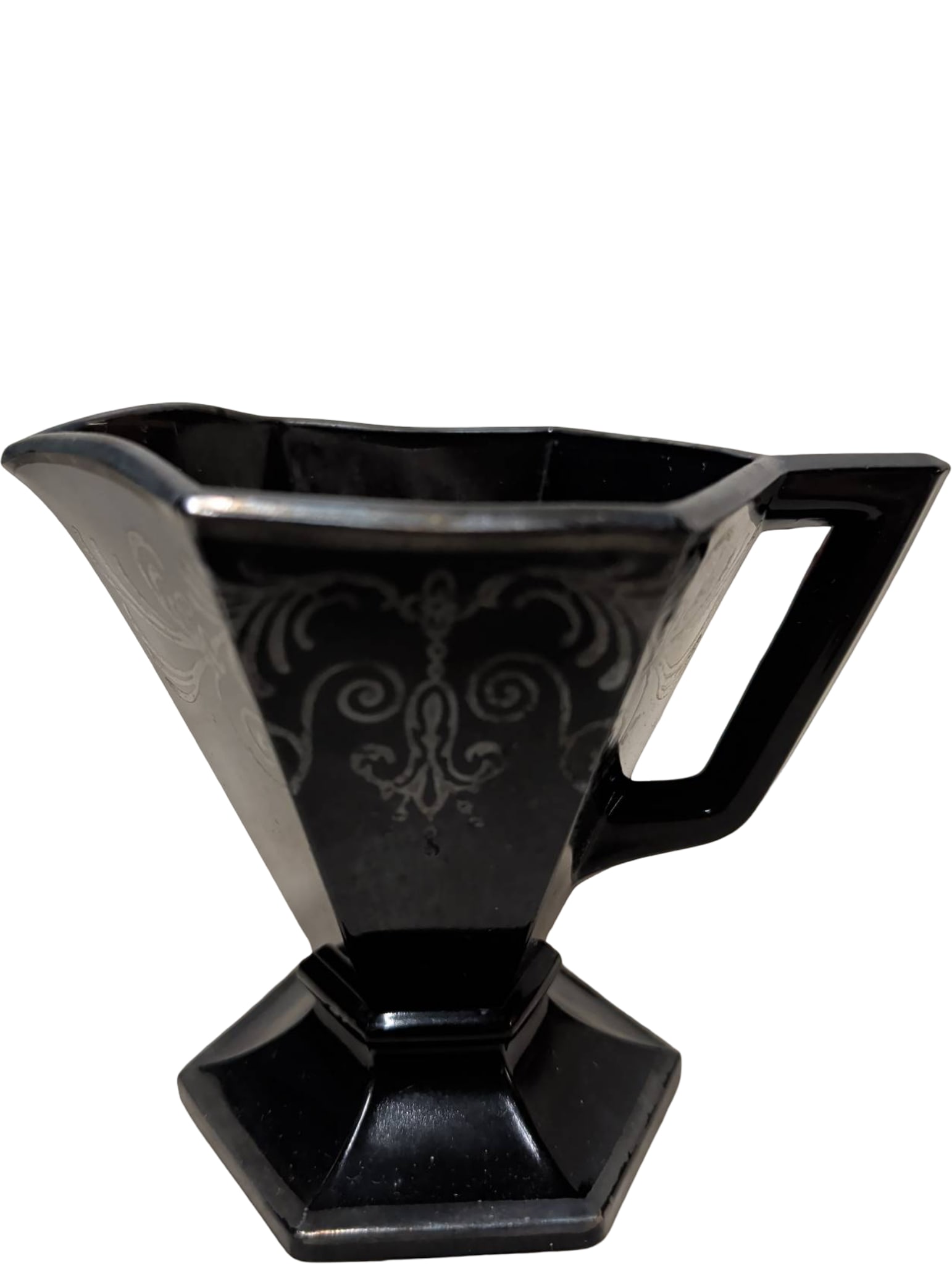 Vintage Art Deco Black Amethyst Glass Creamer with Silver Floral Overlay: Vintage Art Deco black amethyst glass creamer with a hexagonal, footed base. Features intricate silver floral overlay decoration on its surface. Historically linked to manufacturers such as Westmorela