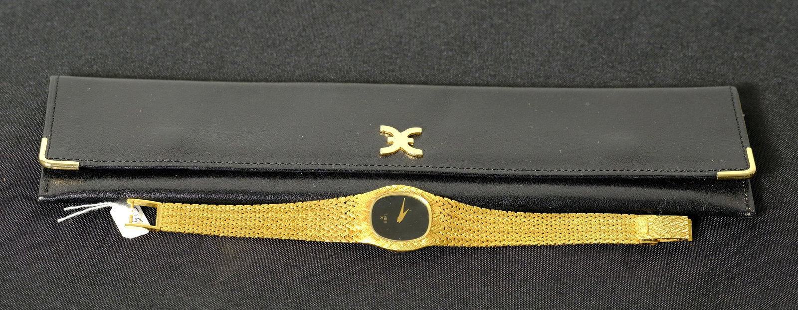 Vintage 18K Gold Ebel Ladies Watch: Vintage 18K Gold watch with original black leather case L 7 3/8 x W 1 in. (inc. clasps)
