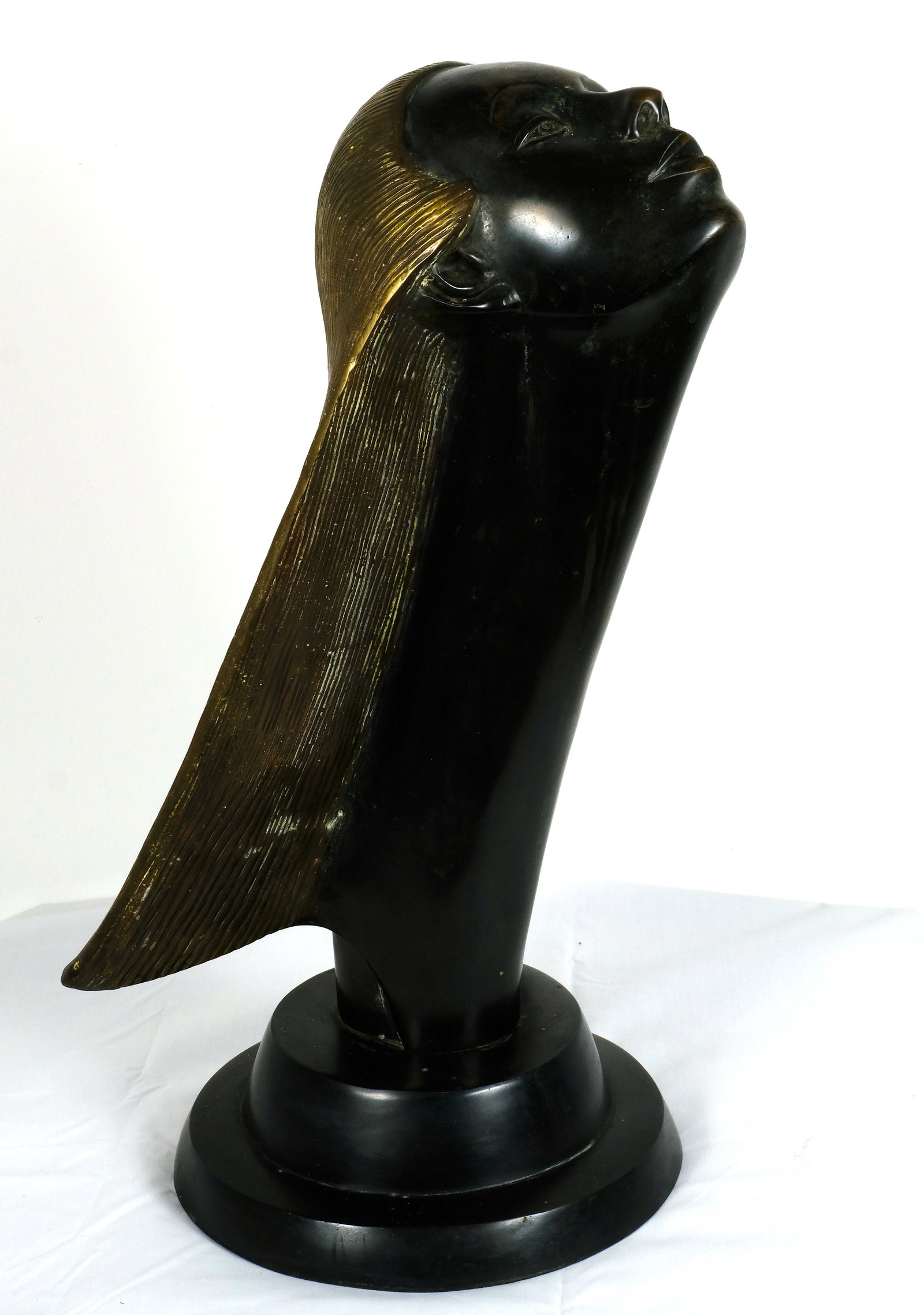 Art Deco Bronze Female sculpture: Bronze head of a Woman looking upward H 20 1/2 x W 11 7/8 in.