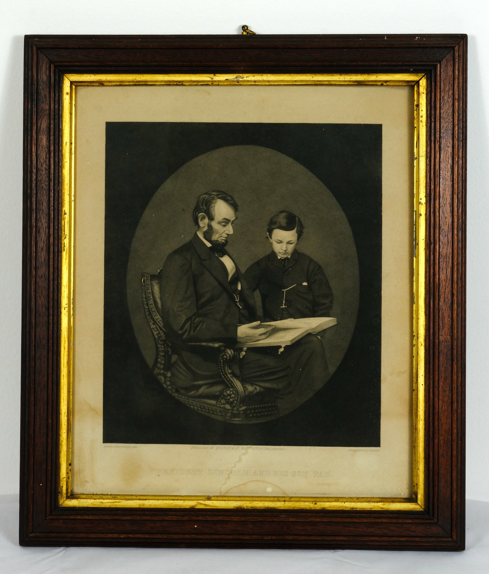 President Lincoln and His son Tad Lithograph : Antique framed Lithograph President Lincoln and His son Tad H 13 1/2 x. W 11 1/4 in. (Sheet size H 10 3/8 x W 8