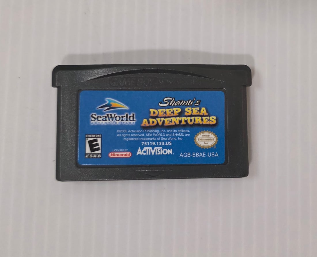 Nintendo Game Boy Advance SeaWorld Shamu's Deep Sea Adventures GBA: Nintendo Game Boy Advance game cartridge: SeaWorld Shamu's Deep Sea Adventures. Loose cartridge only. Condition is shown in the photos. This preowned item shows wear consistent with age and use.