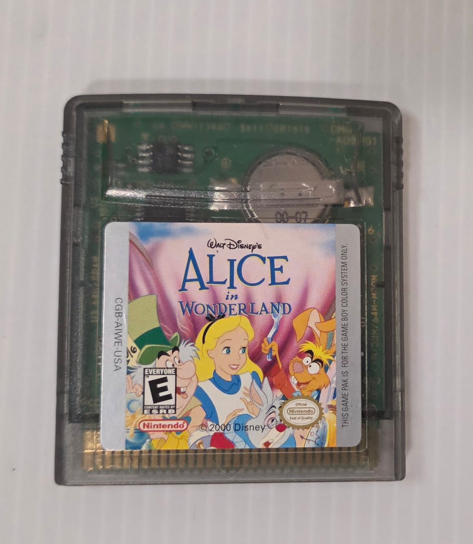 Nintendo Game Boy Color Disney's Alice in Wonderland GBC Cartridge: Nintendo Game Boy Color game cartridge: Walt Disney's Alice in Wonderland. This is a loose cartridge only, and it is reported working. Condition is shown in the photos. This preowned item shows wear c