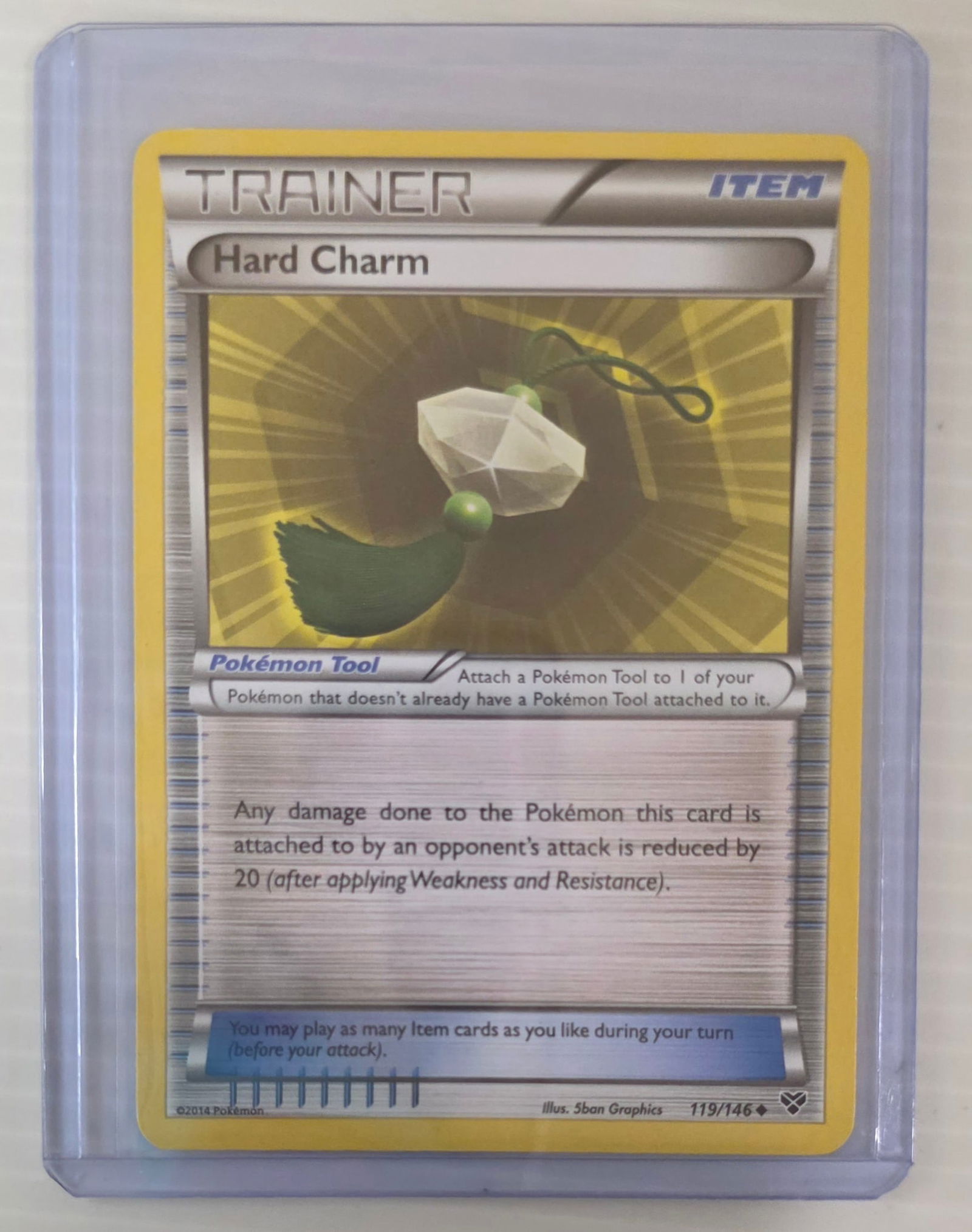 Hard Charm Trainer Item 119/146 Raw Pokemon Card in Top Loader (1 of 4)