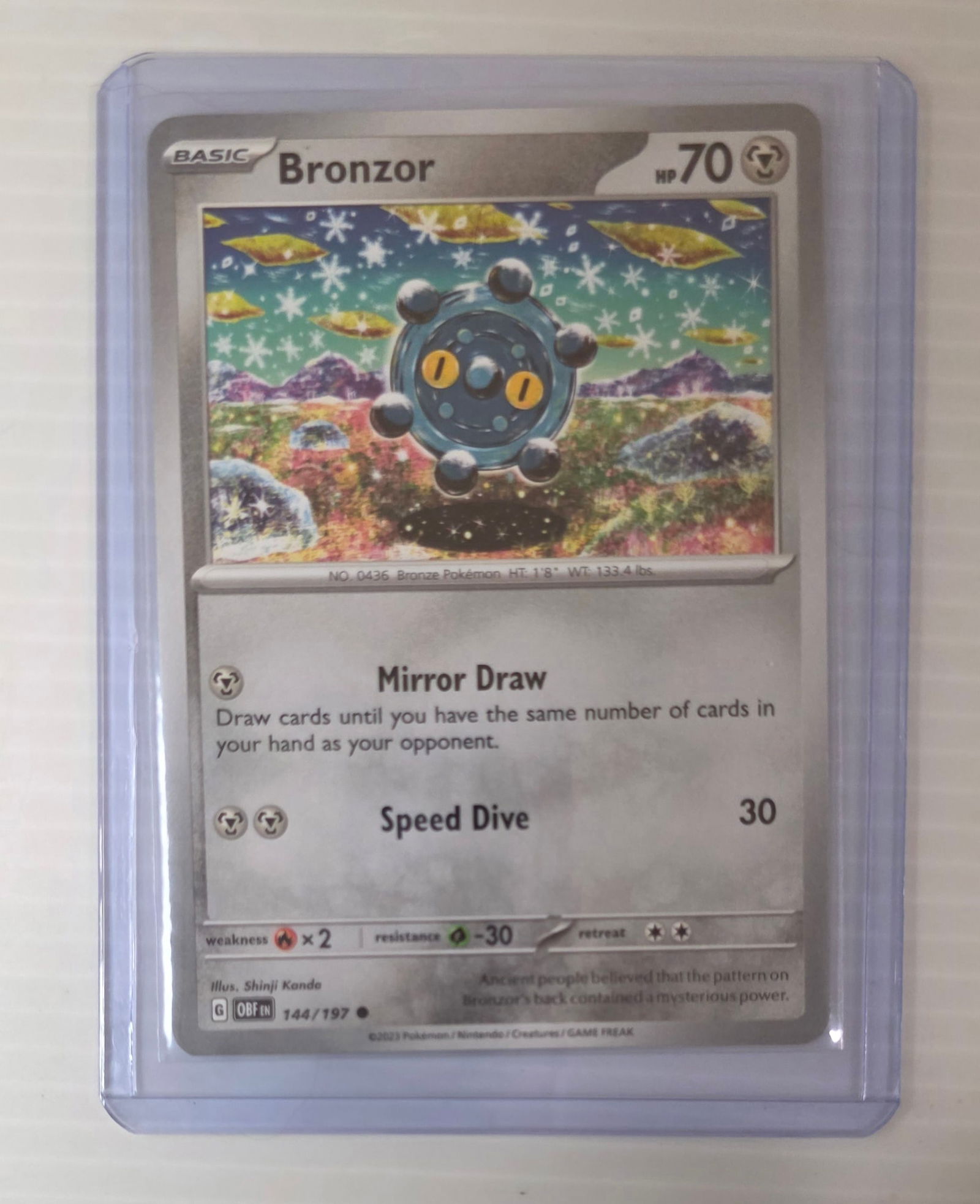Bronzor 144/197 Obsidian Flames Raw Pokemon Card in Top Loader (1 of 4)