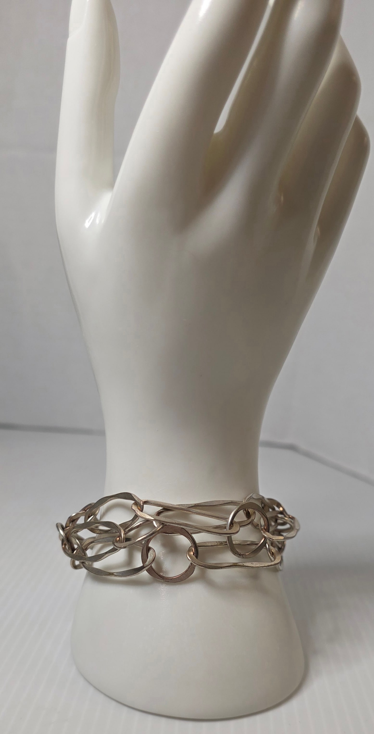 Vintage Silver Tone Multi Link Toggle Bracelet Unmarked Estate Jewelry: Vintage silver tone multi link bracelet featuring mixed elongated and circular link design with toggle clasp closure. Bracelet is unmarked. Non-magnetic under testing. Measures approximately 8 inches