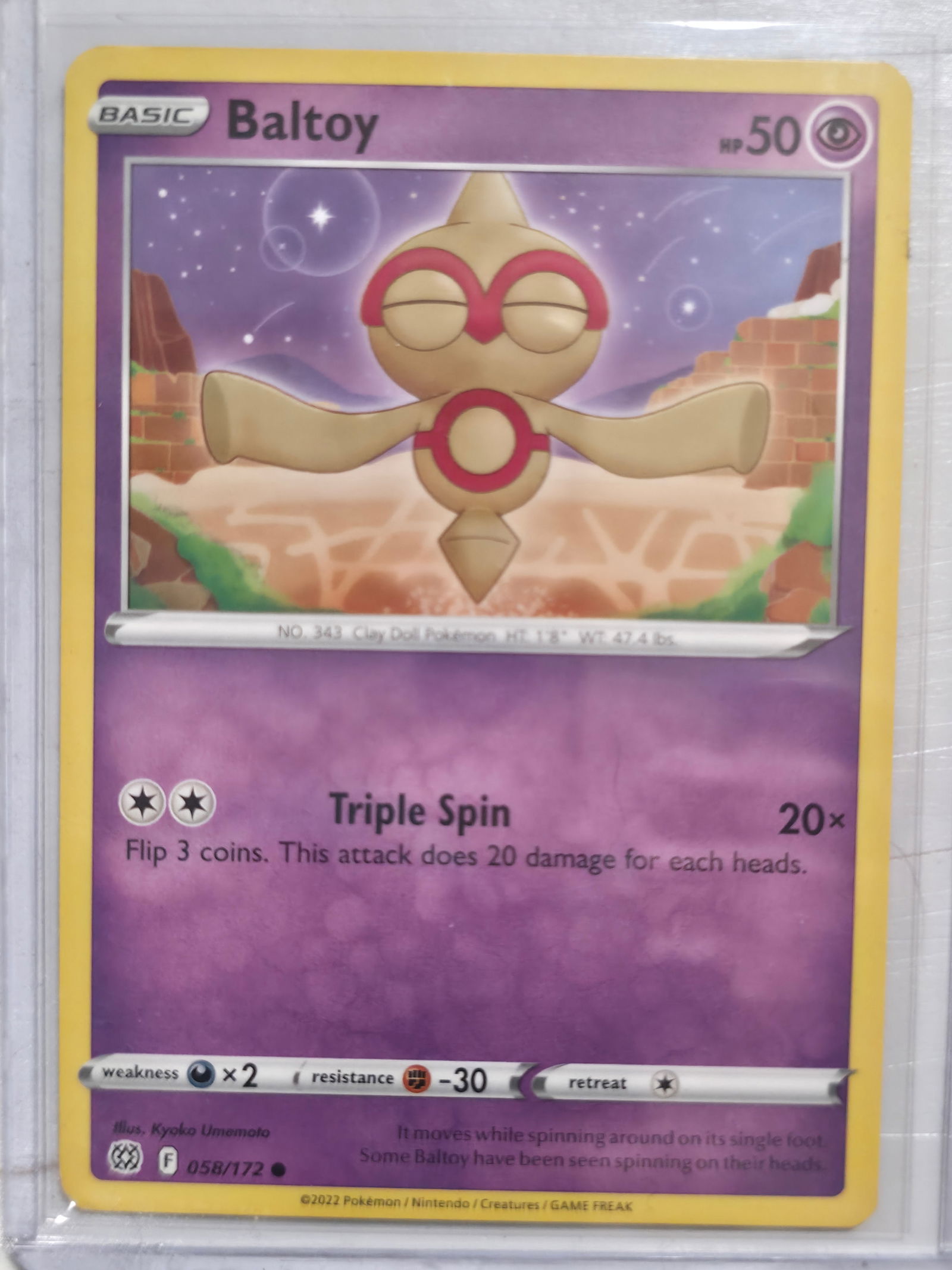 2022 Baltoy Brilliant Stars 058/172 Common: Baltoy Basic Psychic Pokemon. Brilliant Stars set. Card number 058/172. Common non holo. Illustrated by Kyoko Umemoto. 2022 Pokemon Nintendo Creatures GAME FREAK. Preowned card stored in penny sleeve