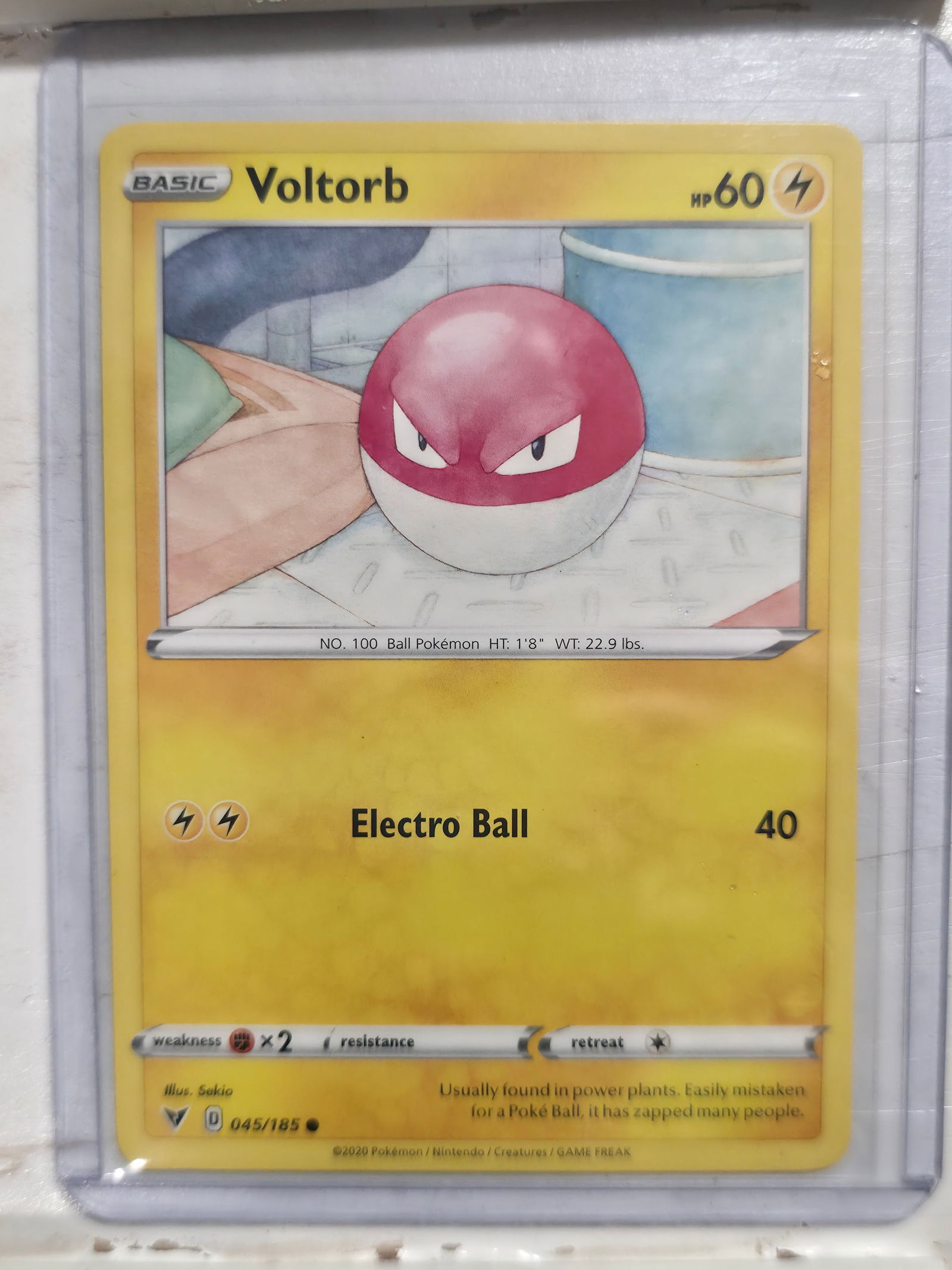 2020 Voltorb Vivid Voltage 045/185 Common: 2020 Voltorb Basic Lightning Pokemon. Vivid Voltage set. Card number 045/185. Common non holo. HP 60. Illustrated by Sekio. Preowned card stored in penny sleeve and top loader. Sold as shown.