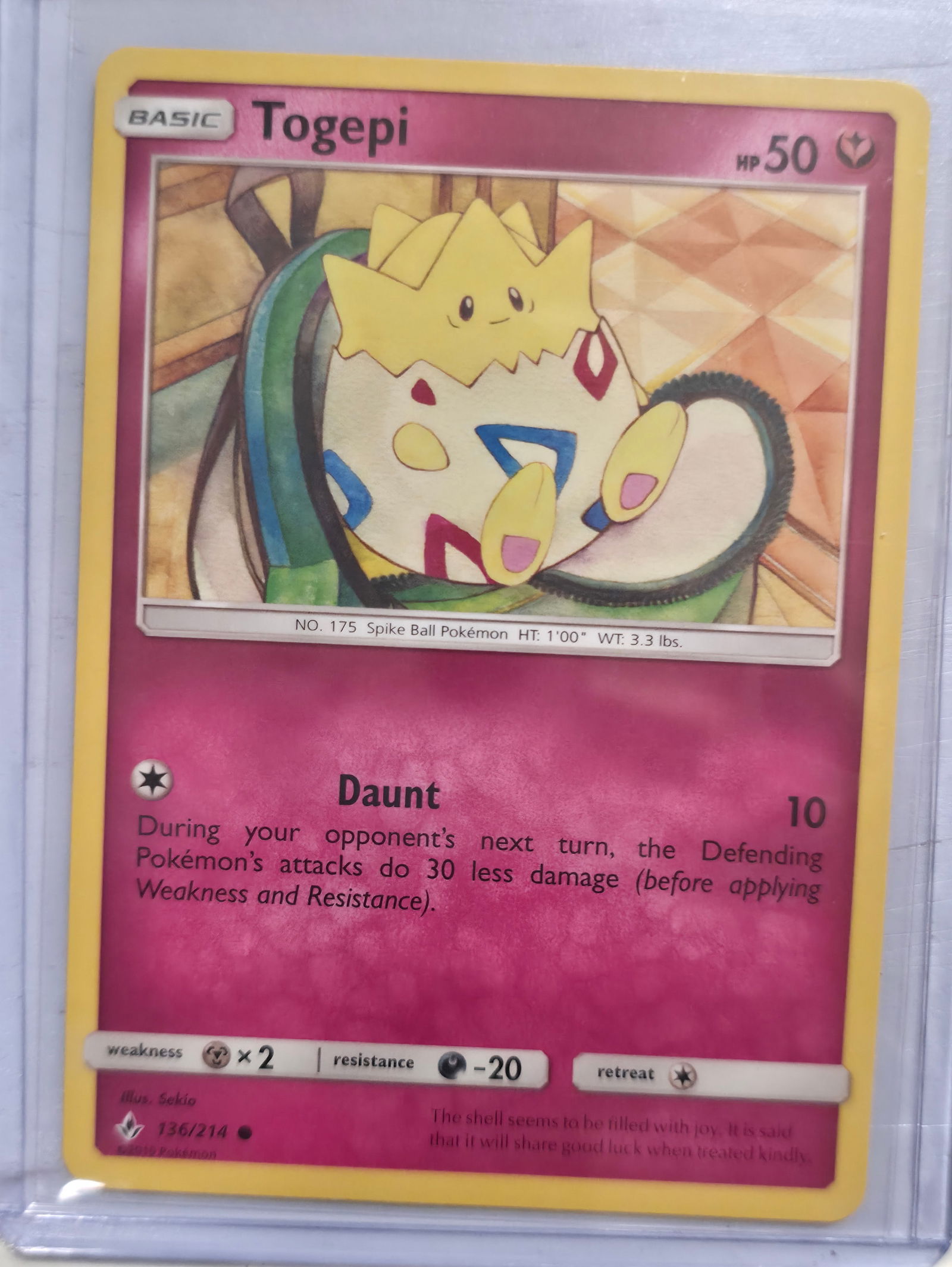 2019 Togepi Unbroken Bonds 136/214: 2019 Togepi Basic Fairy Pokemon. Unbroken Bonds set. Card number 136/214. HP 50. Attack Daunt 10. Illustrated by sowsow. Non holo. Preowned card stored in penny sleeve and top loader. Sold as shown.