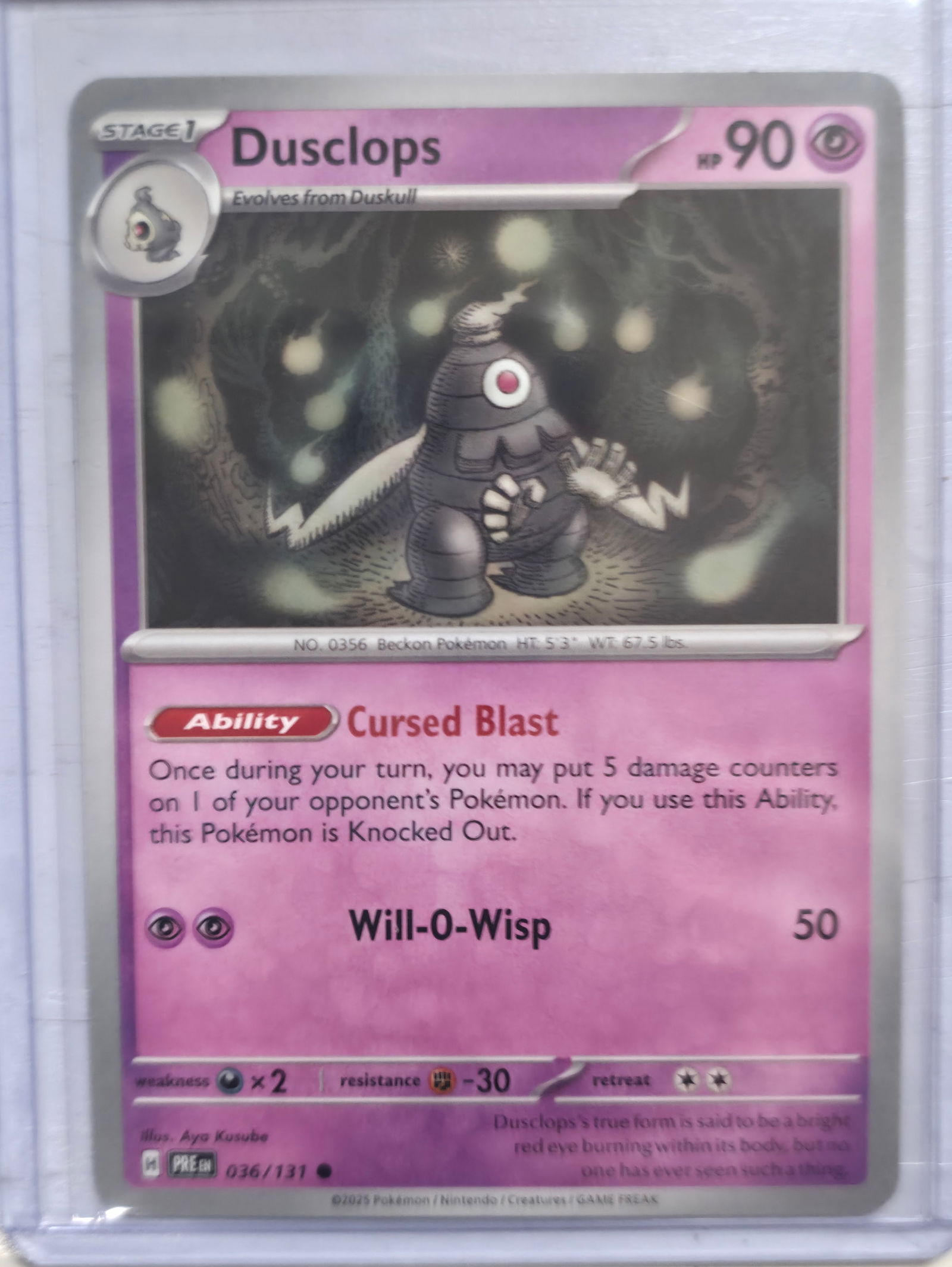 2025 Dusclops Prismatic Evolutions 036/131: 2025 Dusclops Stage 1 Psychic Pokemon. Evolves from Duskull. Prismatic Evolutions set. Card number 036/131. HP 90. Ability Cursed Blast. Attack Will-O-Wisp 50. Illustrated by Aya Kusube. Non holo. Pre