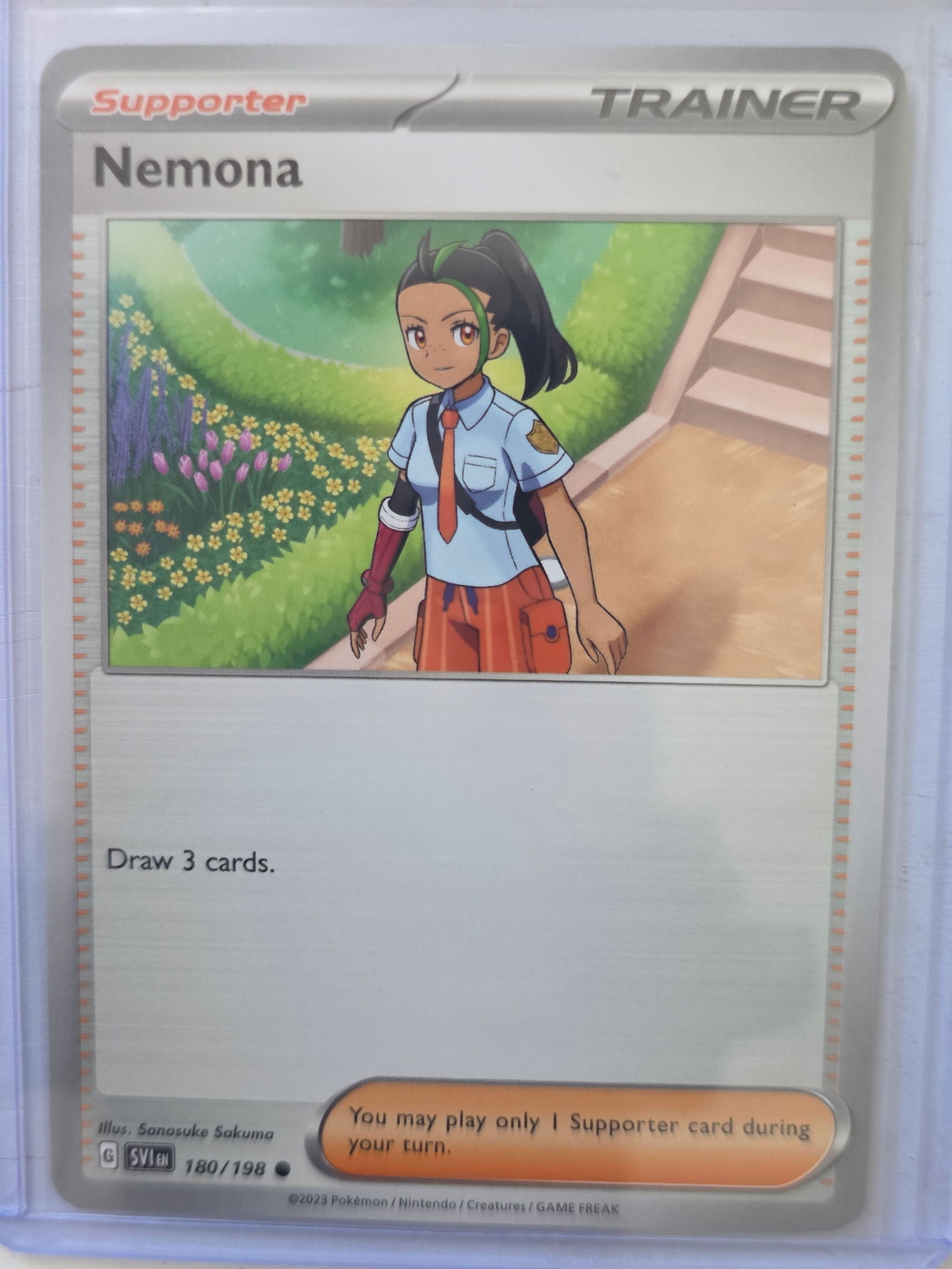 2023 Scarlet & Violet Nemona 180/198 Uncommon Trainer Pokemon TCG Card Nintendo: 2023 Nemona Supporter Trainer Pokemon TCG card from the Scarlet & Violet base set, card number 180/198. Official Nintendo Pokemon trading card produced by Pokemon, Nintendo, Creatures, and GAME FREAK.