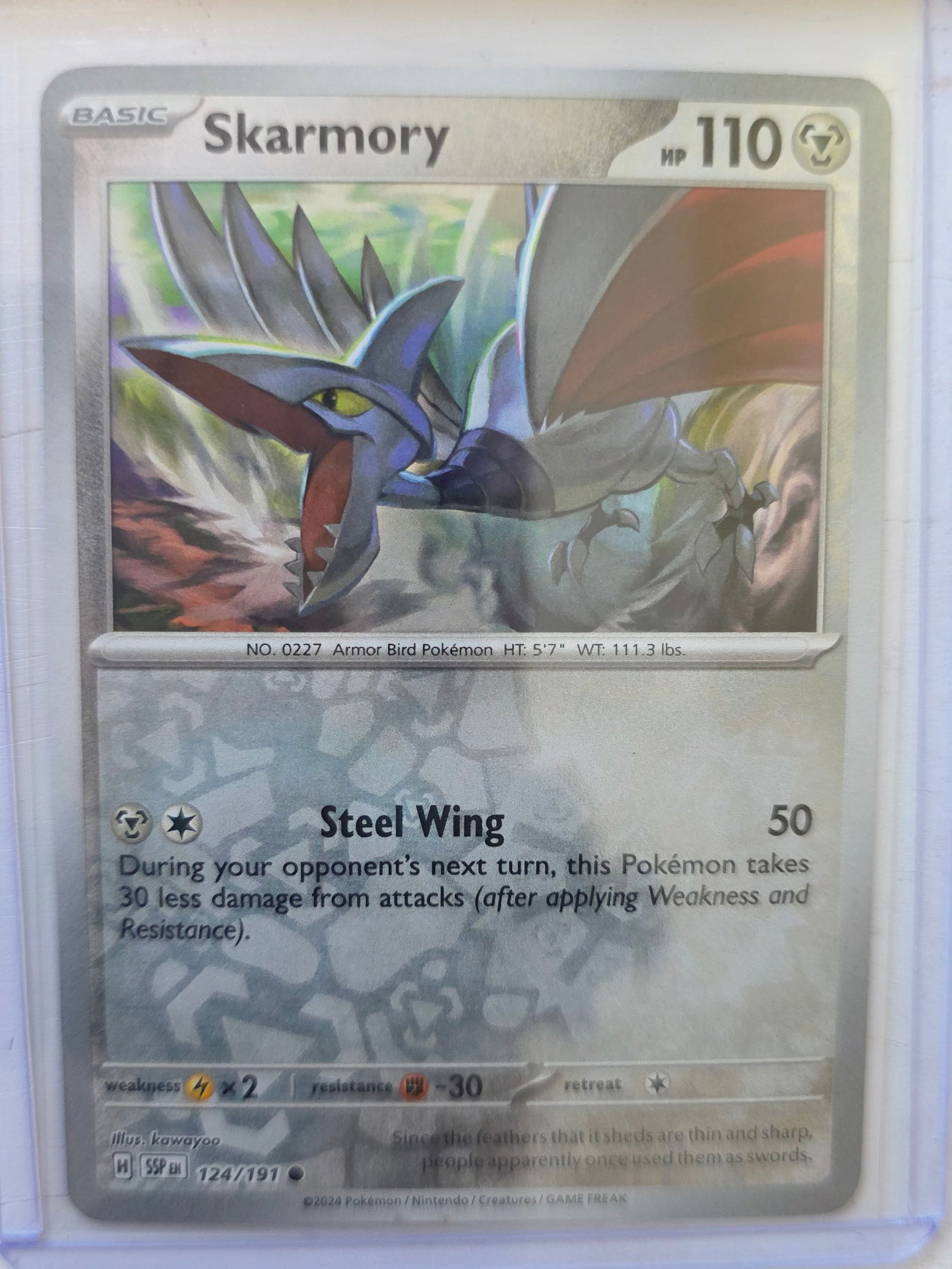 2024 Skarmory Temporal Forces 124/191 Reverse Holo Pokemon Card: 2024 Pokemon Skarmory reverse holo card numbered 124/191 from the Scarlet & Violet Temporal Forces expansion set. Illustrated by kawayoo. Reverse holographic foil pattern across the card surface. Card