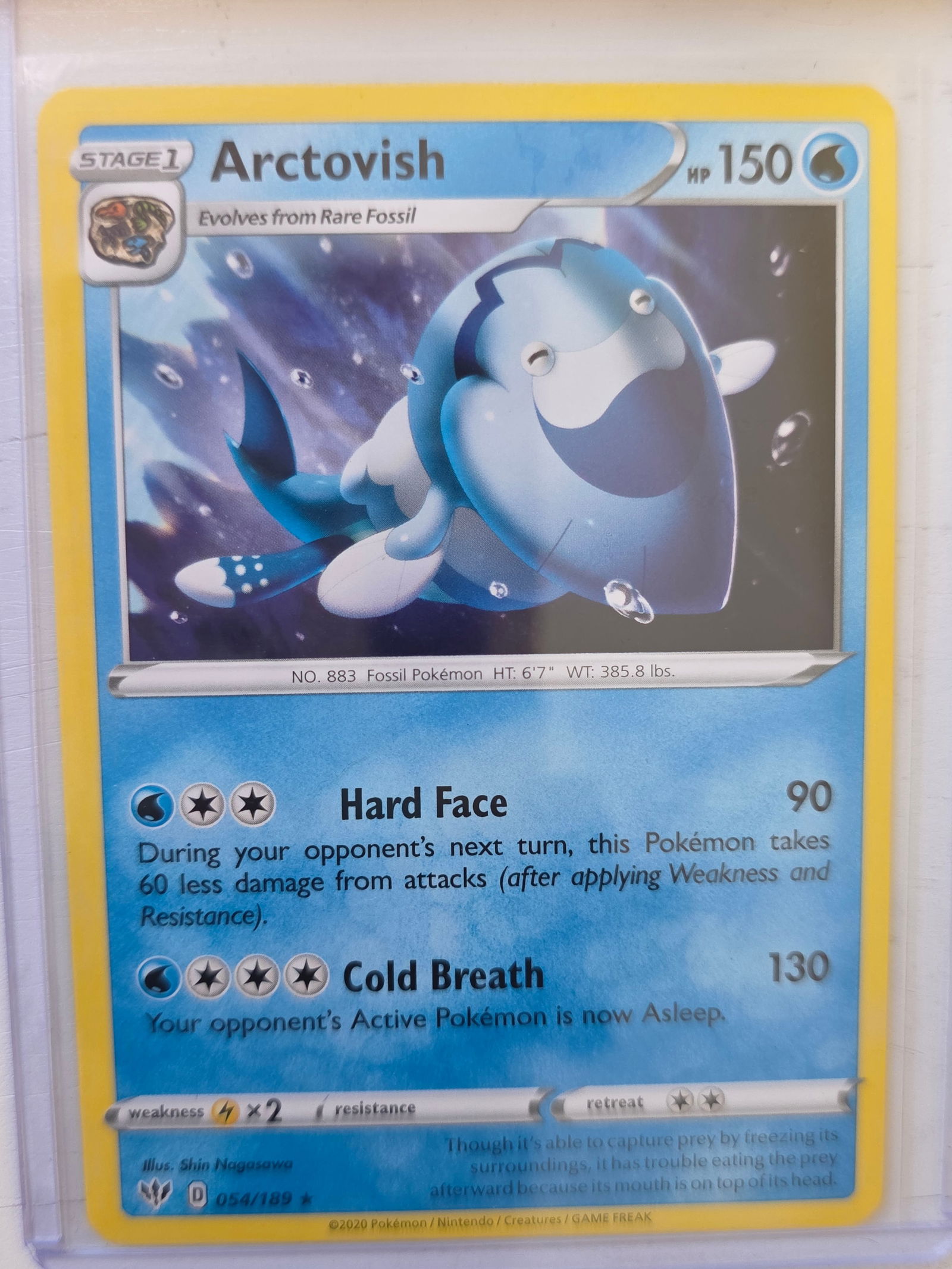 2020 Arctovish Darkness Ablaze 054/189 Rare Pokemon Card: 2020 Pokemon Arctovish card numbered 054/189 from the Sword & Shield Darkness Ablaze expansion set. Illustrated by Shin Nagasawa. Stage 1 Water type Pokemon evolving from Rare Fossil featuring the att