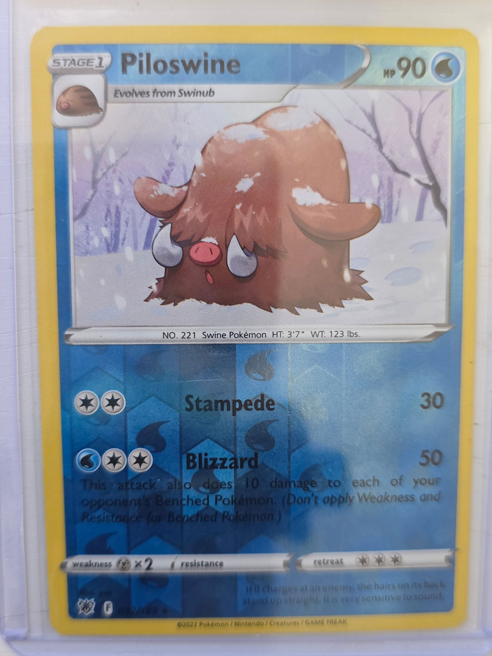2022 Piloswine Astral Radiance 032/189 Reverse Holo Pokemon Card: 2022 Pokemon Piloswine Stage 1 reverse holo card numbered 032/189 from the Sword & Shield Astral Radiance expansion set. Evolves from Swinub. Illustrated by yuu. Reverse holographic foil pattern acros