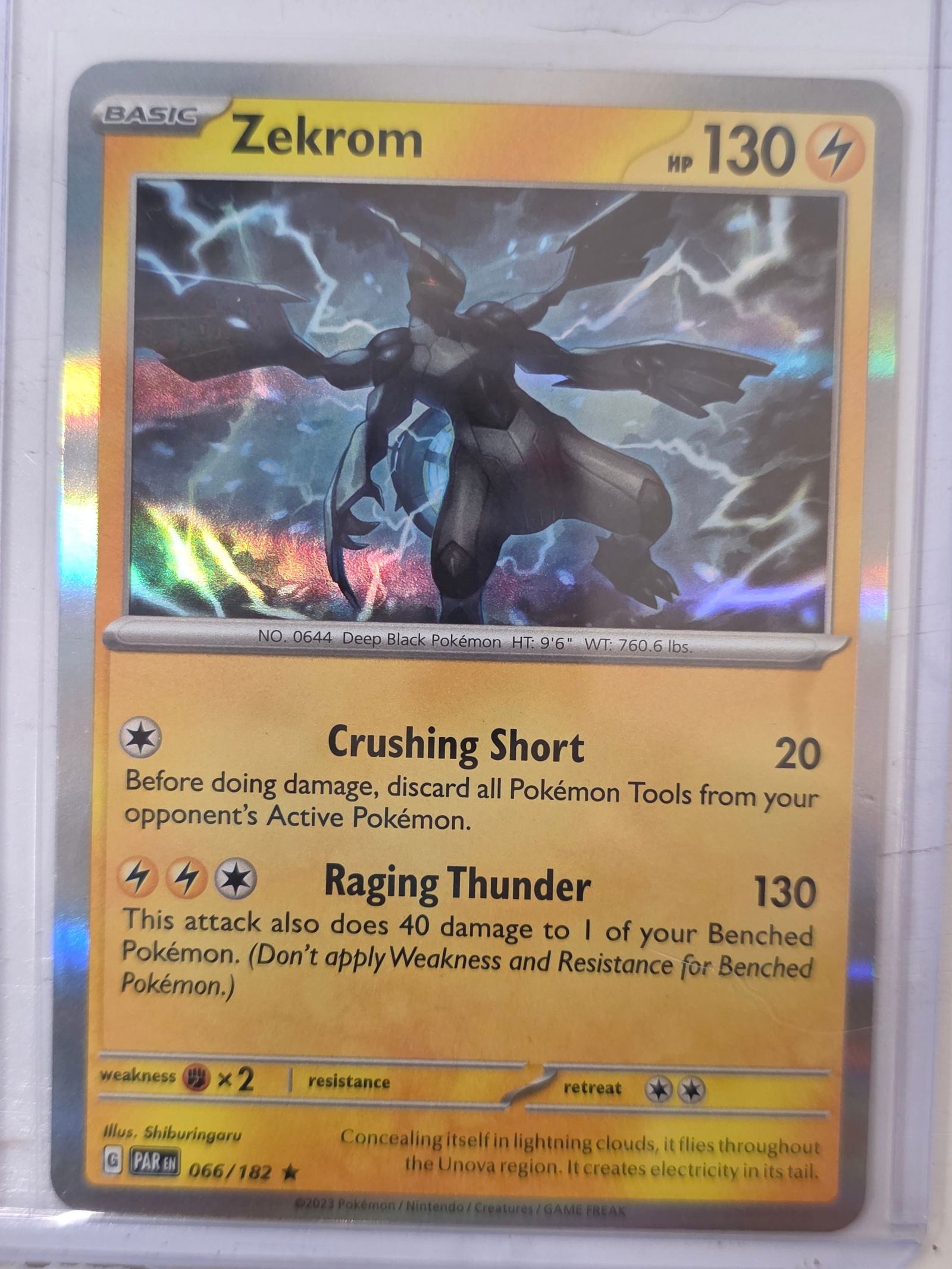 2023 Zekrom Paradox Rift 066/182 Reverse Holo Pokemon Card: 2023 Pokemon Zekrom reverse holo card numbered 066/182 from the Scarlet & Violet Paradox Rift expansion set. Illustrated by Shiburingaru. Reverse holographic foil pattern across the card surface. Card