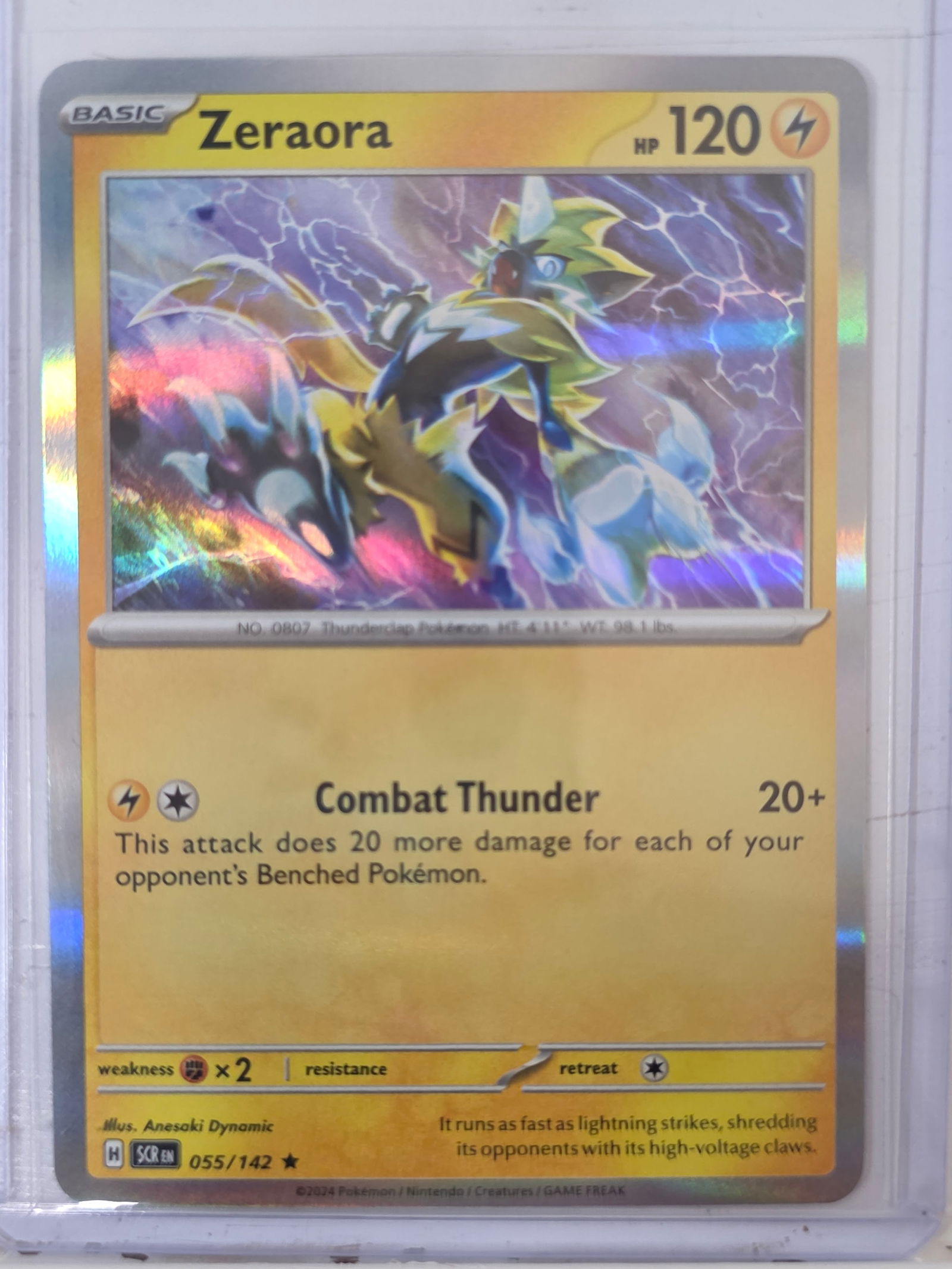 2024 Zeraora Stellar Crown 055/142 Holo Rare Pokemon Card: 2024 Pokemon Zeraora holographic rare card numbered 055/142 from the Scarlet & Violet Stellar Crown expansion set. Illustrated by Anesaki Dynamic. Standard holographic rare finish. Card stored in penn