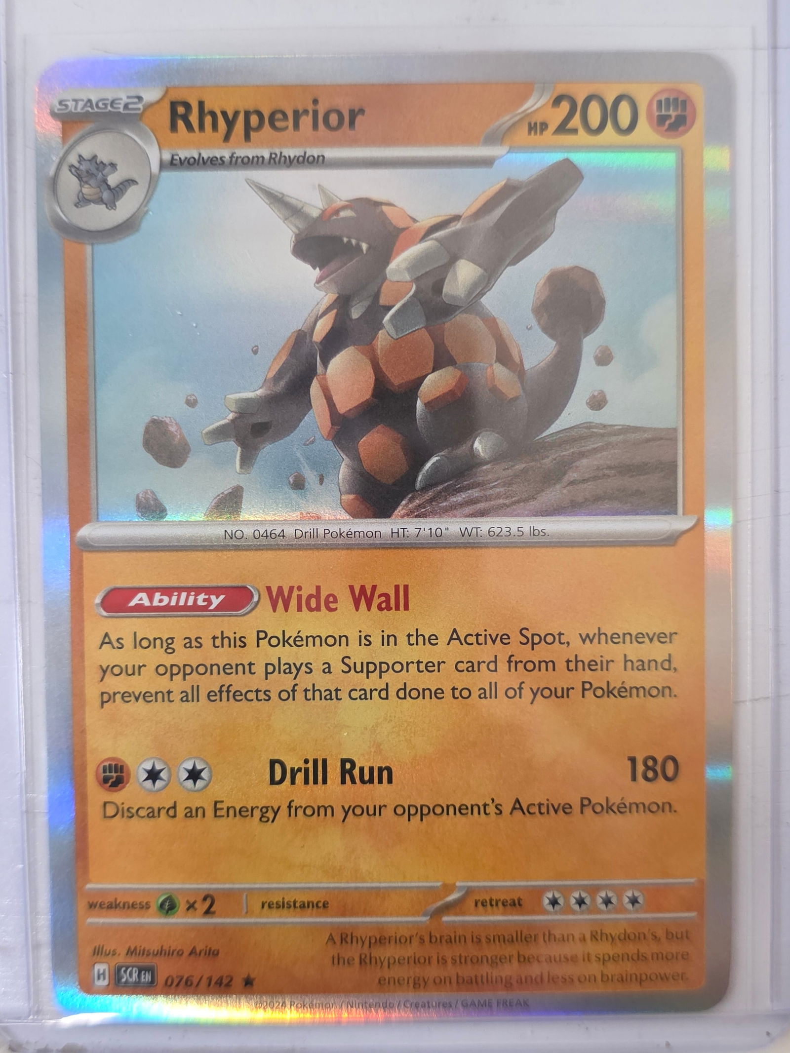 2024 Rhyperior Stellar Crown 076/142 Holo Pokemon Card: 2024 Pokemon Rhyperior holographic card numbered 076/142 from the Scarlet & Violet Stellar Crown expansion set. Illustrated by Mitsuhiro Arita. Standard holographic rare finish across the illustration