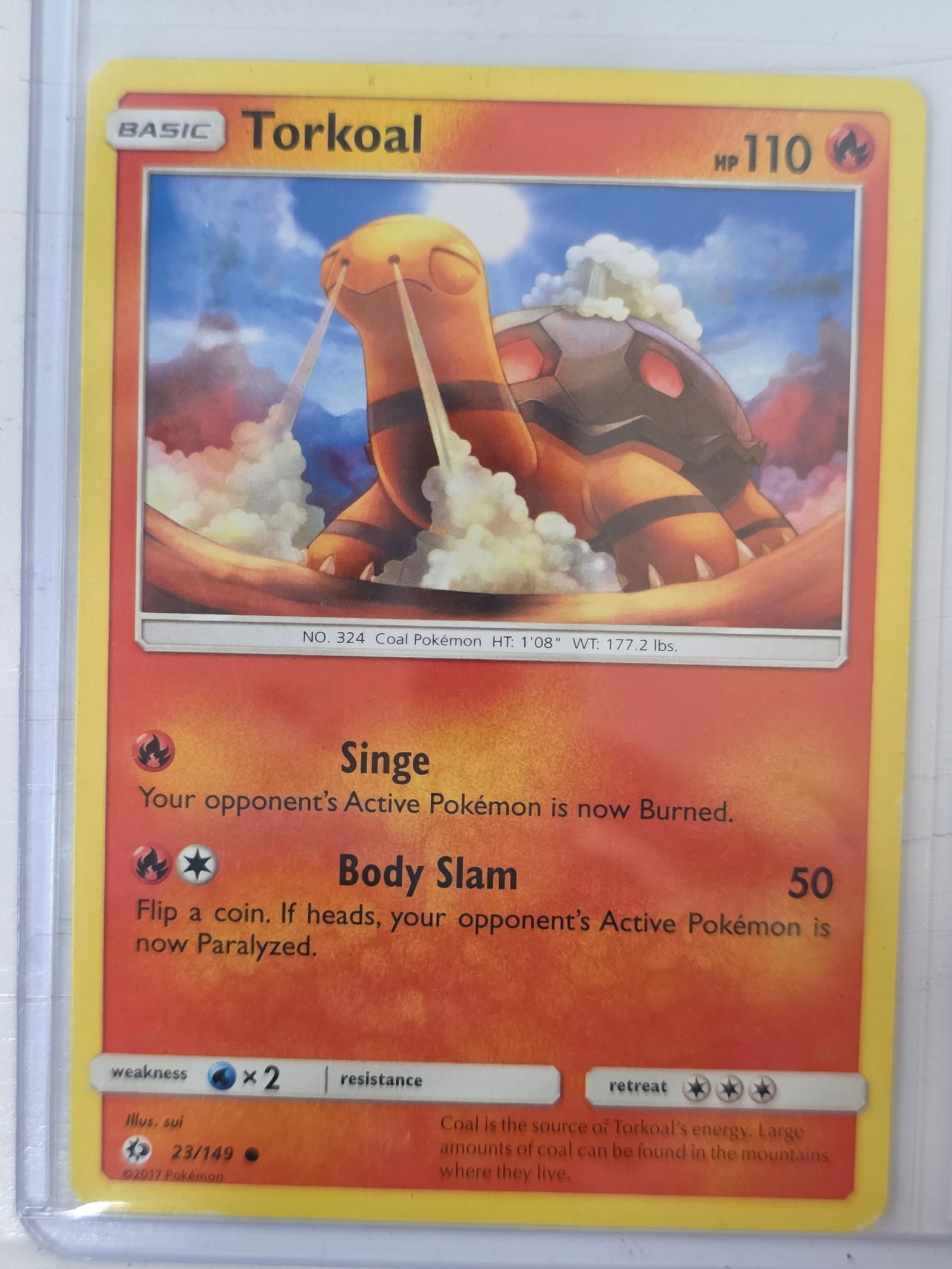 2017 Torkoal Sun & Moon 023/149 Pokemon Card: 2017 Pokemon Torkoal card numbered 023/149 from the Sun & Moon base expansion set. Illustrated by sui. Standard non-holographic card. Card stored in penny sleeve and top loader.