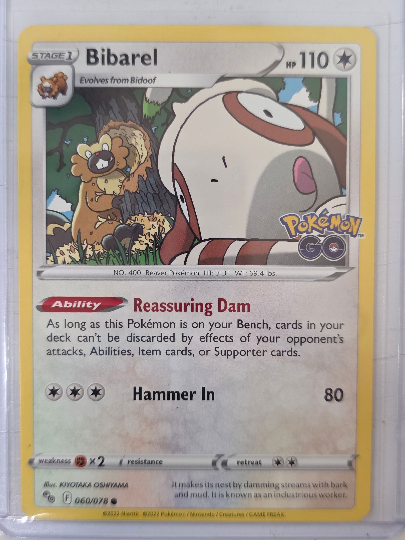 2022 Bibarel Pokemon GO 060/078 Holo Pokemon Card: 2022 Pokemon Bibarel Stage 1 card evolving from Bidoof from the Pokemon GO set numbered 060/078 featuring the Pokemon GO set logo. Holographic card stored in penny sleeve and top loader.