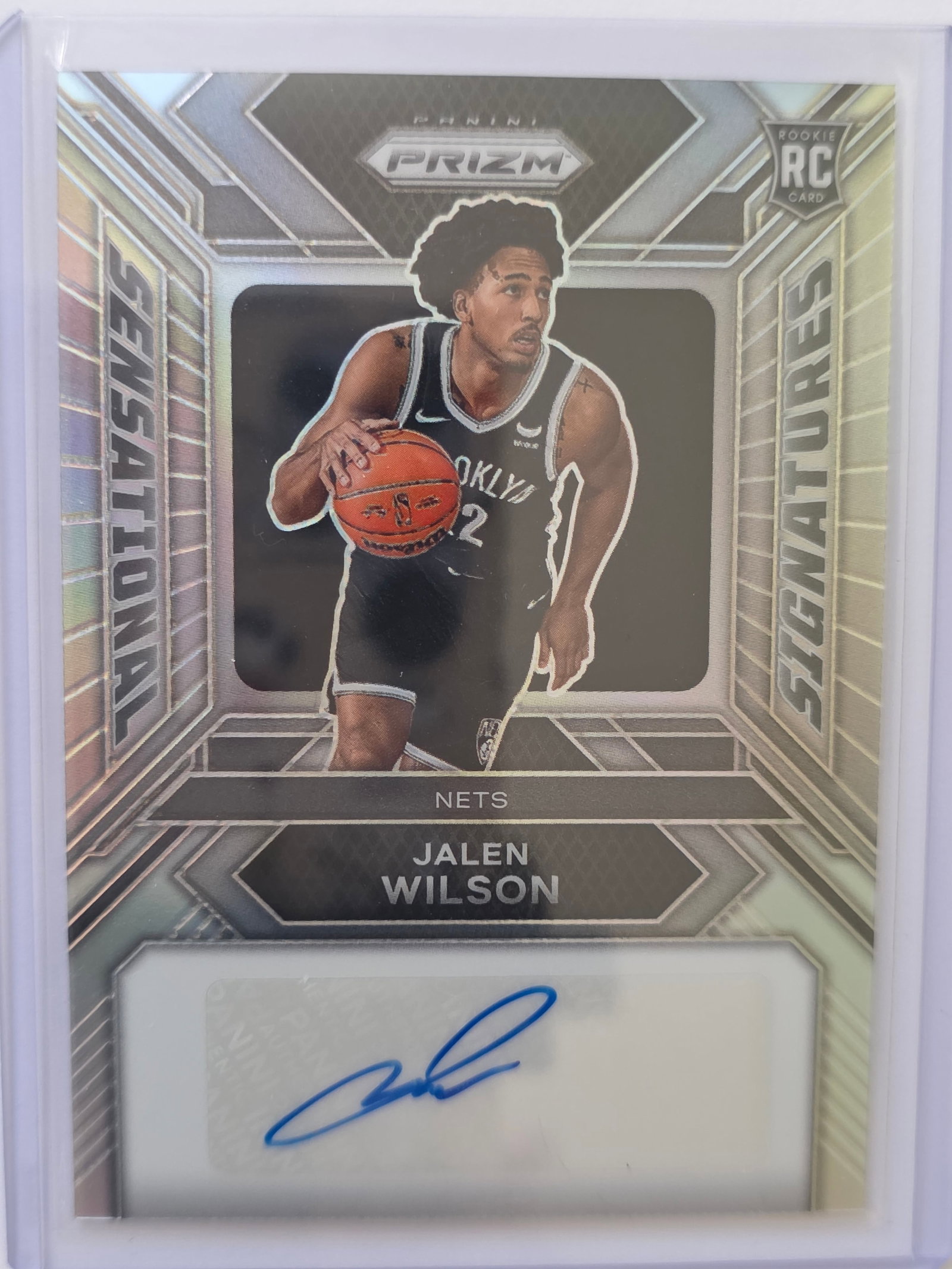 Jalen Wilson ROOKIE AUTO PRIZM Signatures 2023 Panini Prizm Nets: 2023-24 Panini Prizm Jalen Wilson Rookie Signatures Autograph for the Brooklyn Nets. Features bold on-card style autograph with prizm finish. Rookie card of the Nets forward from the popular Prizm set