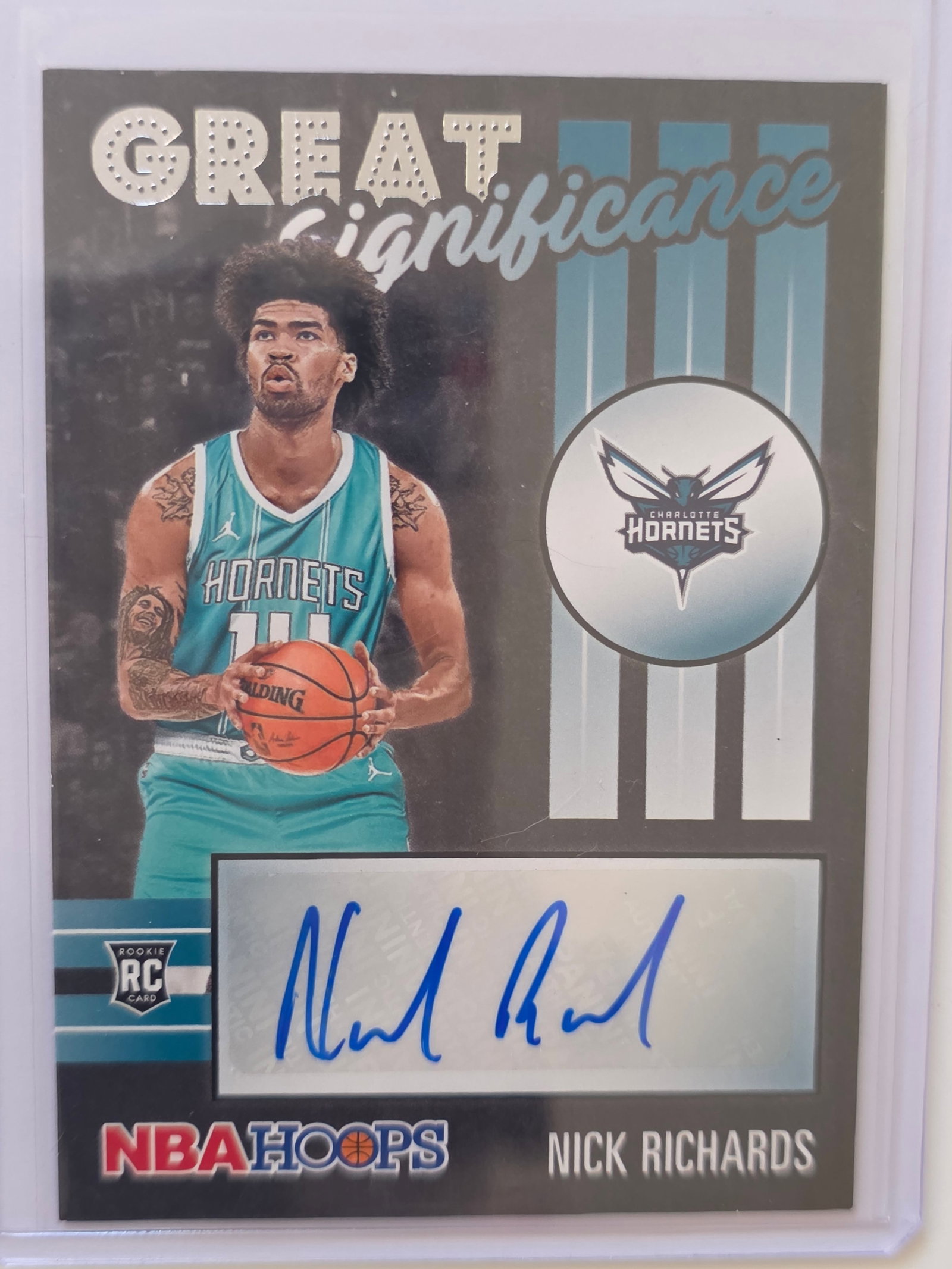 Nick Richards ROOKIE AUTO Great Significance 2020 Panini NBA Hoops Hornets: 2020-21 Panini NBA Hoops Nick Richards Rookie Great Significance Autograph for the Charlotte Hornets. Features certified autograph from the Great Significance insert set. Rookie issue of the Hornets c