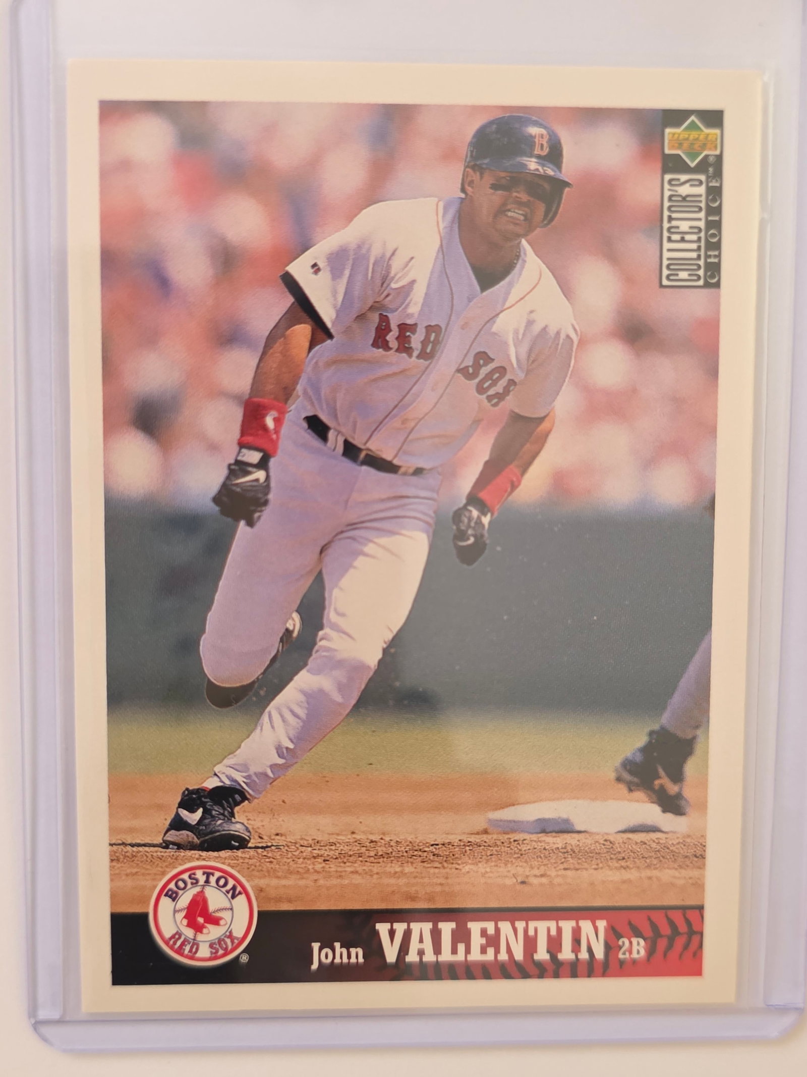 Base Card: 1997 Upper Deck Collector’s Choice John Valentin card featuring the Boston Red Sox second baseman. Base card from the Collector’s Choice set showing Valentin during his MLB career. Stored in prote