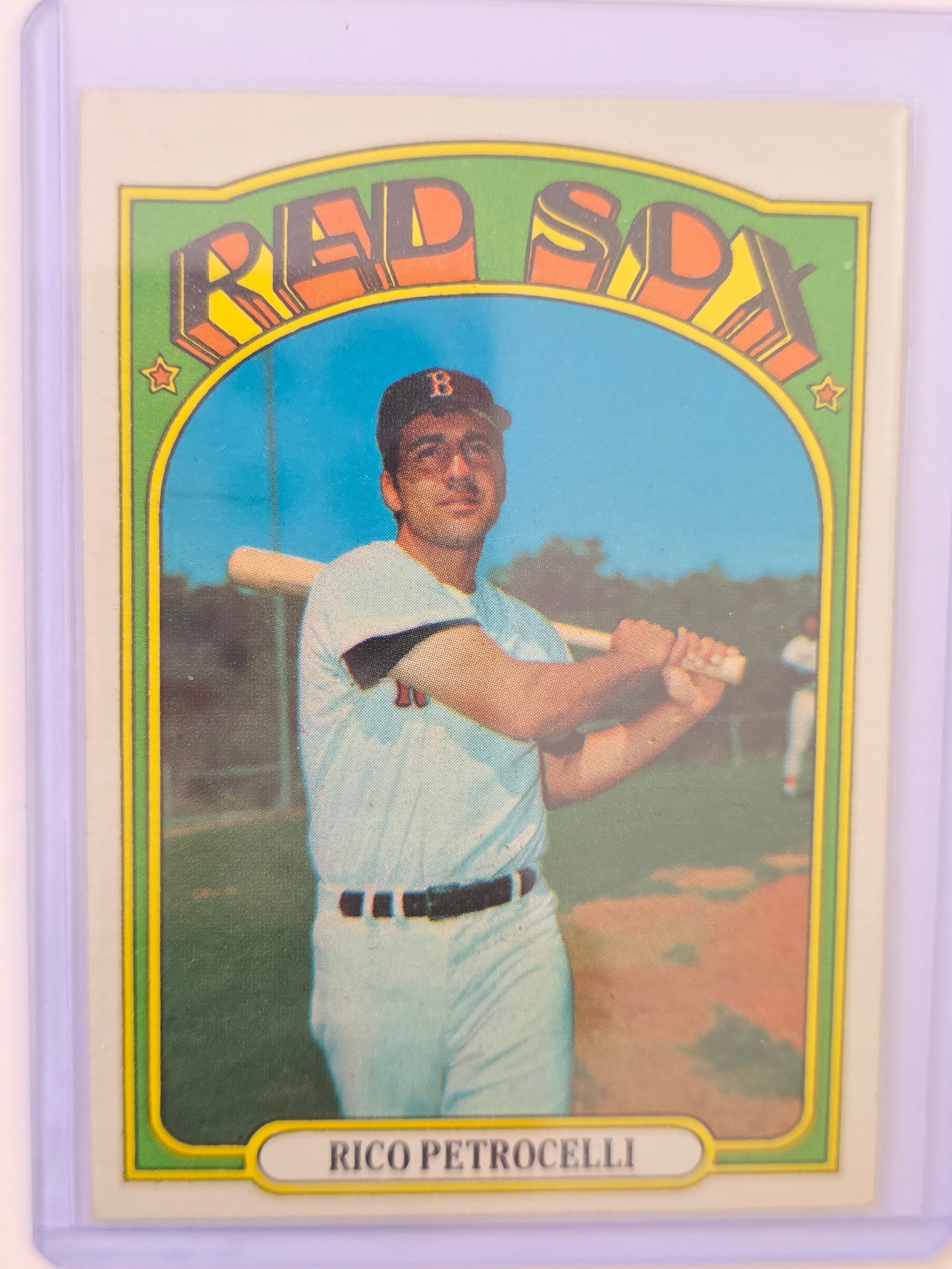 Rico Petrocelli Red Sox Vintage 1972 Topps 3rd Base: 1972 Topps Rico Petrocelli card featuring the Boston Red Sox third baseman. Classic vintage Topps issue with bold Red Sox design from the early 1970s. Card shows age-related wear consistent with vinta