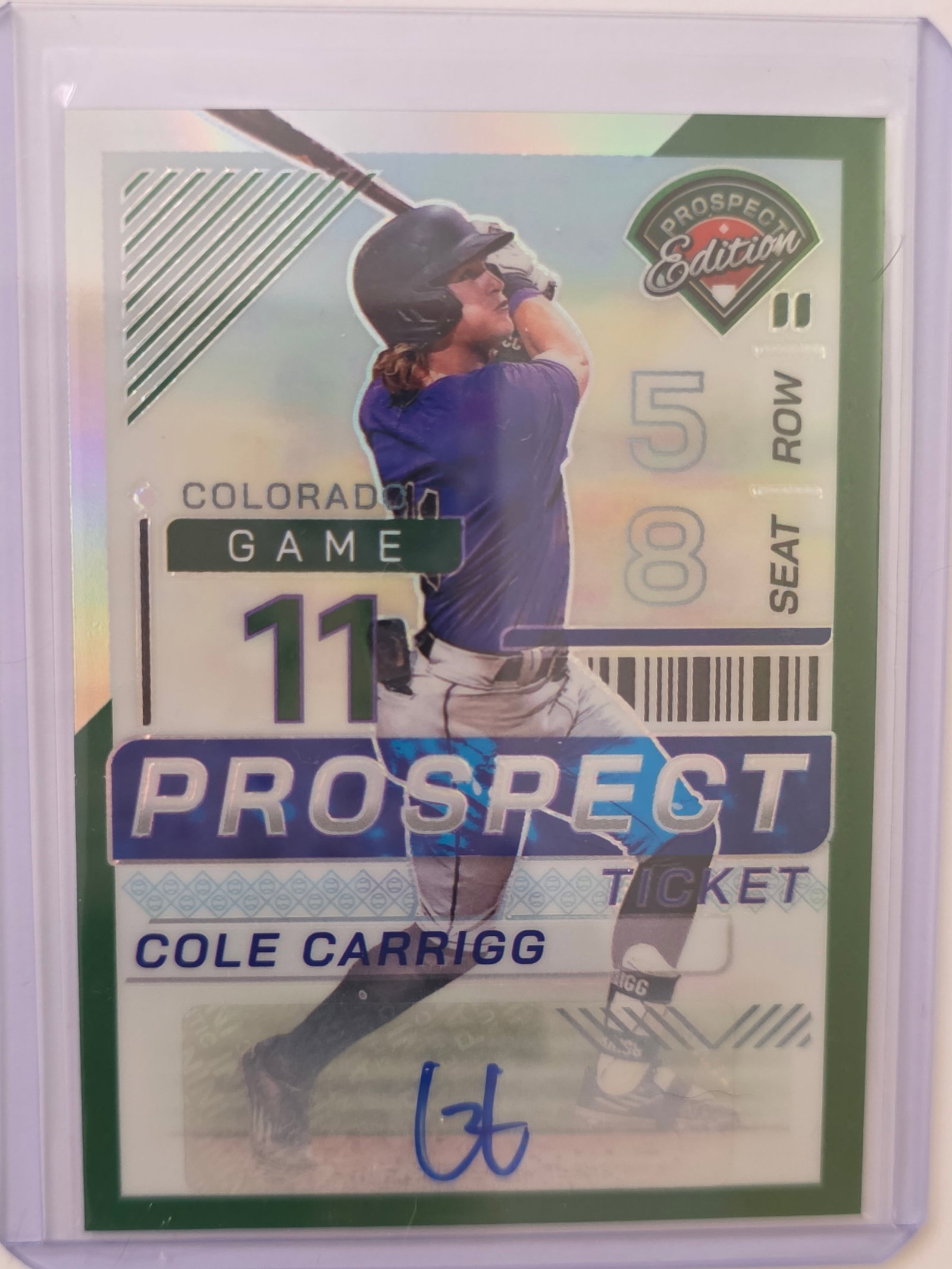 Cole Carrigg AUTO Prizm Prospect Edition Rockies Ticket: 2024 Panini Prizm Prospect Edition Cole Carrigg Prospect Ticket autograph card featuring Colorado prospect. On-card style autograph with Prospect Edition design and Prizm finish. Autograph is guarante