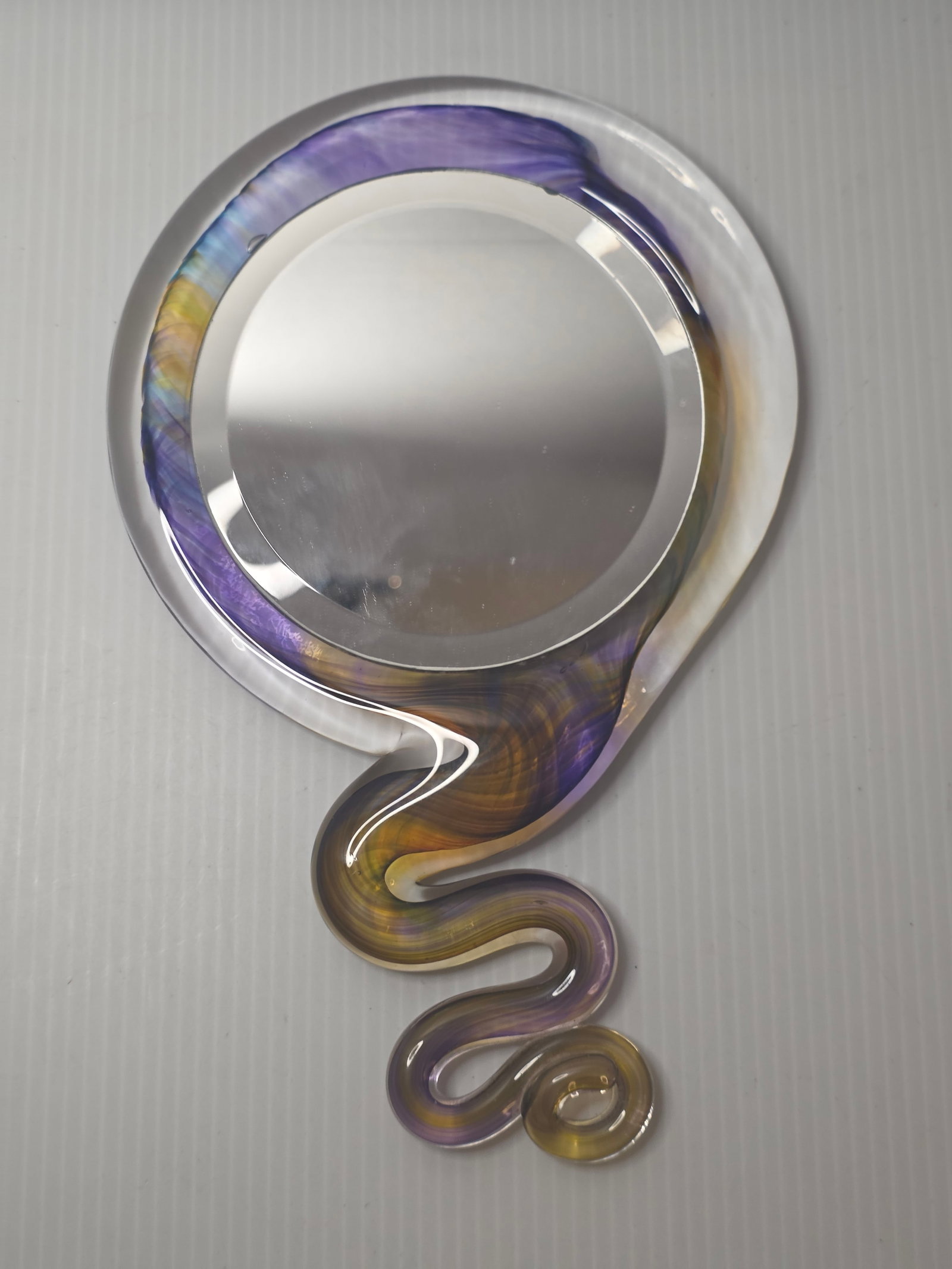 Kurt Carlson Art Glass Magic Mirror Dish Signed 2000 Carlson Glassworks: Handblown studio art glass dish titled Magic Mirror by Kurt Carlson, produced at Carlson Glassworks and signed and dated 2000 on the underside.The piece features a flowing sculptural design with an ex