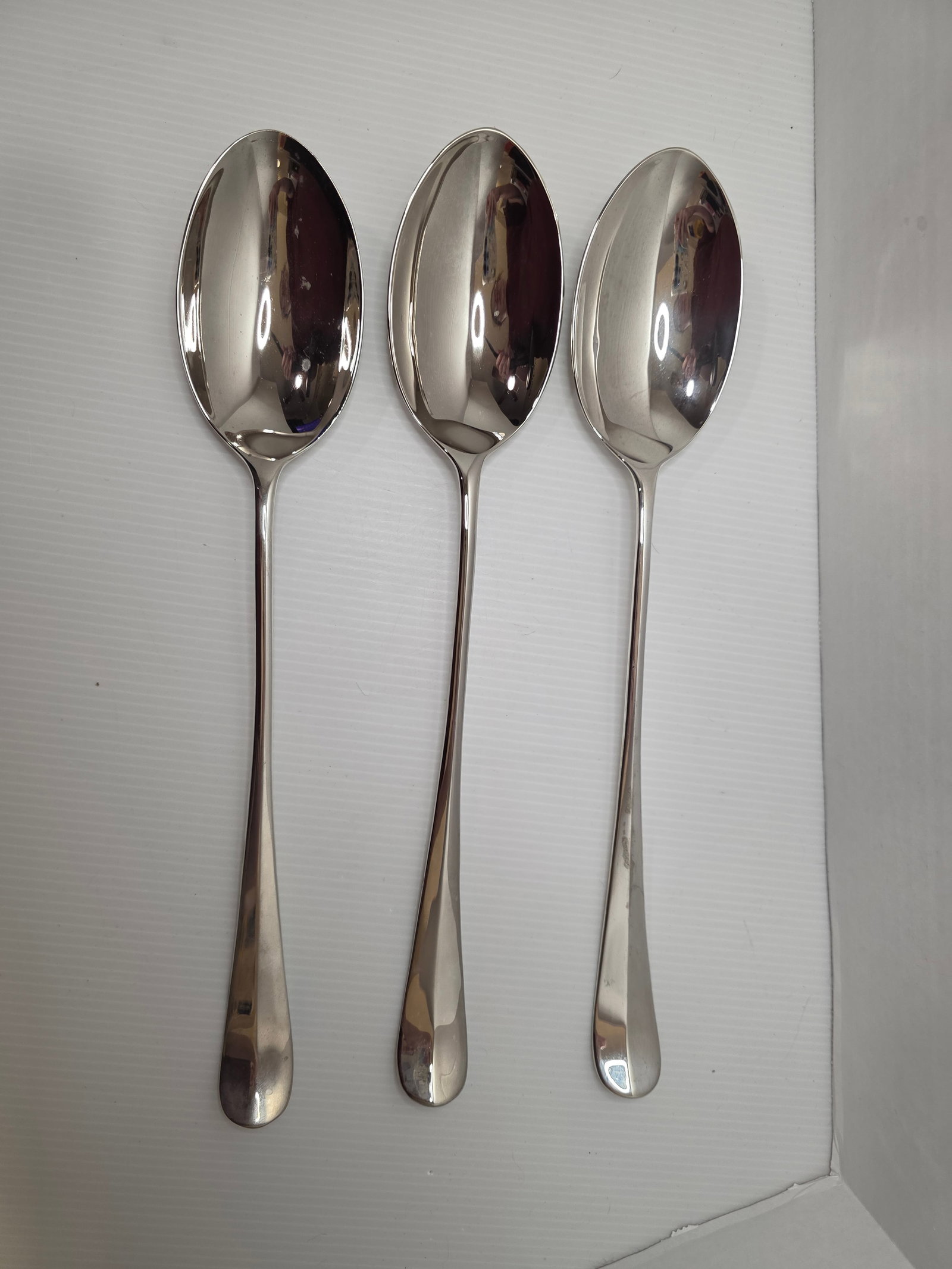 International Silver Co Serving Spoons Set 3 Large Silverplate 1991: Set of three extra large serving spoons by International Silver Co. Each spoon retains the original manufacturer label reading International Silver Co Silverplated Made in China 1991.The spoons featur