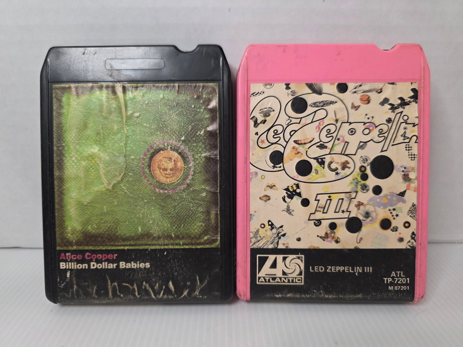 Led Zeppelin III Alice Cooper Billion Dollar Babies 8 Track Tape Lot: Lot of two vintage 8 track stereo tape cartridges. Includes Led Zeppelin III on Atlantic Records and Alice Cooper Billion Dollar Babies on Warner Bros Records.Both are original 8 track cartridges from