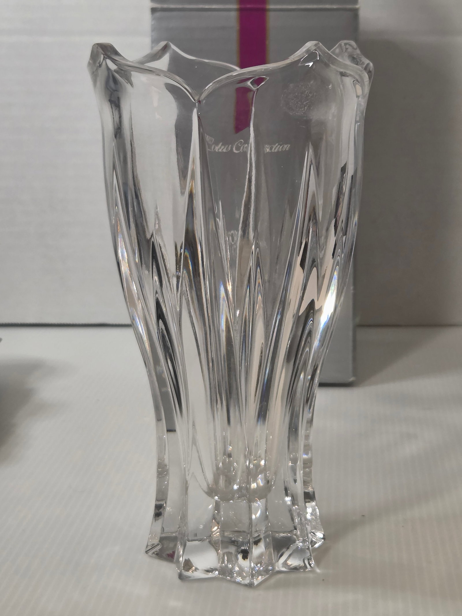 Gorham Lotus Vase Crystal 7 3/4 Inch C606 Lead Crystal Original Box: Gorham full lead crystal vase from the Lotus Collection, item C606. Measures approximately 7 3/4 inches tall. Features a flared lotus form with faceted sides and starburst base.Includes original box.