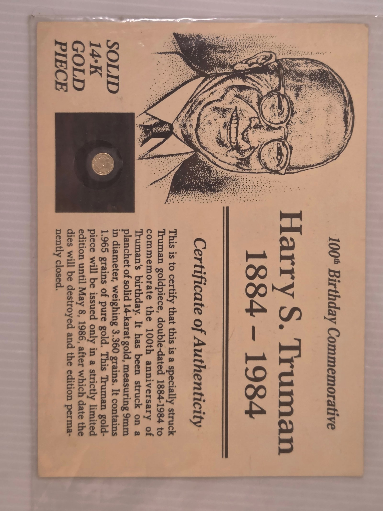 Harry S Truman 14K Gold Mini Coin 1984 Commemorative w Certificate: Harry S. Truman 1884–1984 100th Birthday commemorative mini coin struck in solid 14K gold. Includes original certificate card.Preowned condition. Coin remains mounted in card. Card shows light age w