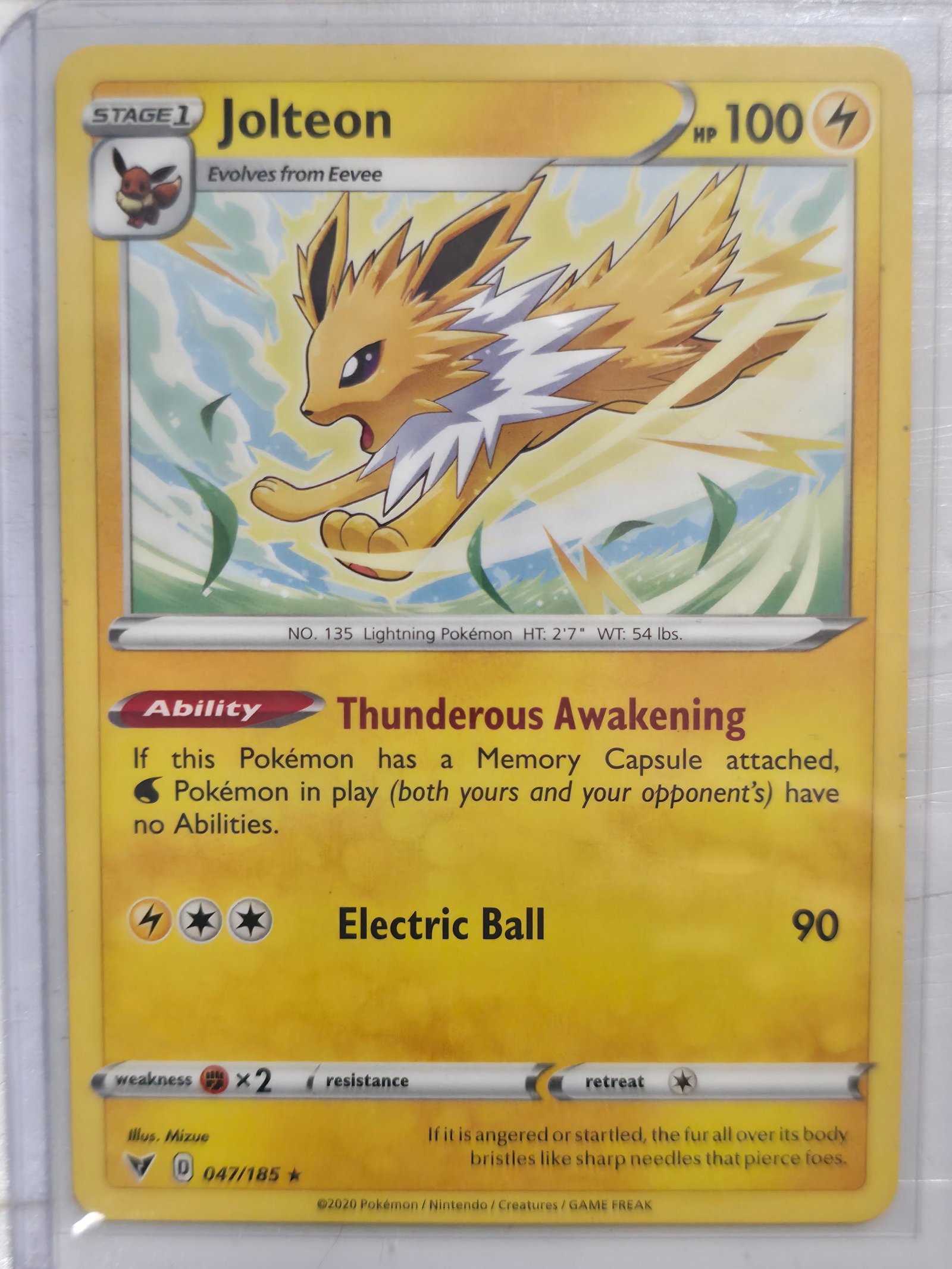 2020 Jolteon Vivid Voltage 047/185 Rare: 2020 Jolteon Stage 1 Lightning Pokemon. Evolves from Eevee. Vivid Voltage set. Card number 047/185. Rare non holo. HP 100. Ability Thunderous Awakening. Illustrated by Mizue. Preowned card stored in p