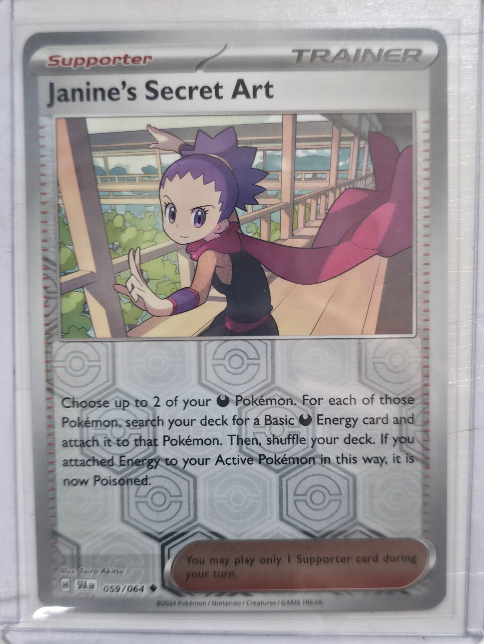 2024 Janine's Secret Art Shrouded Fable 059/064 Rare: 2024 Janine's Secret Art Supporter Trainer card. Shrouded Fable set. Card number 059/064. Rare non holo. Illustrated by Taira Akitsu. Regulation mark H. Preowned card stored in penny sleeve and top lo