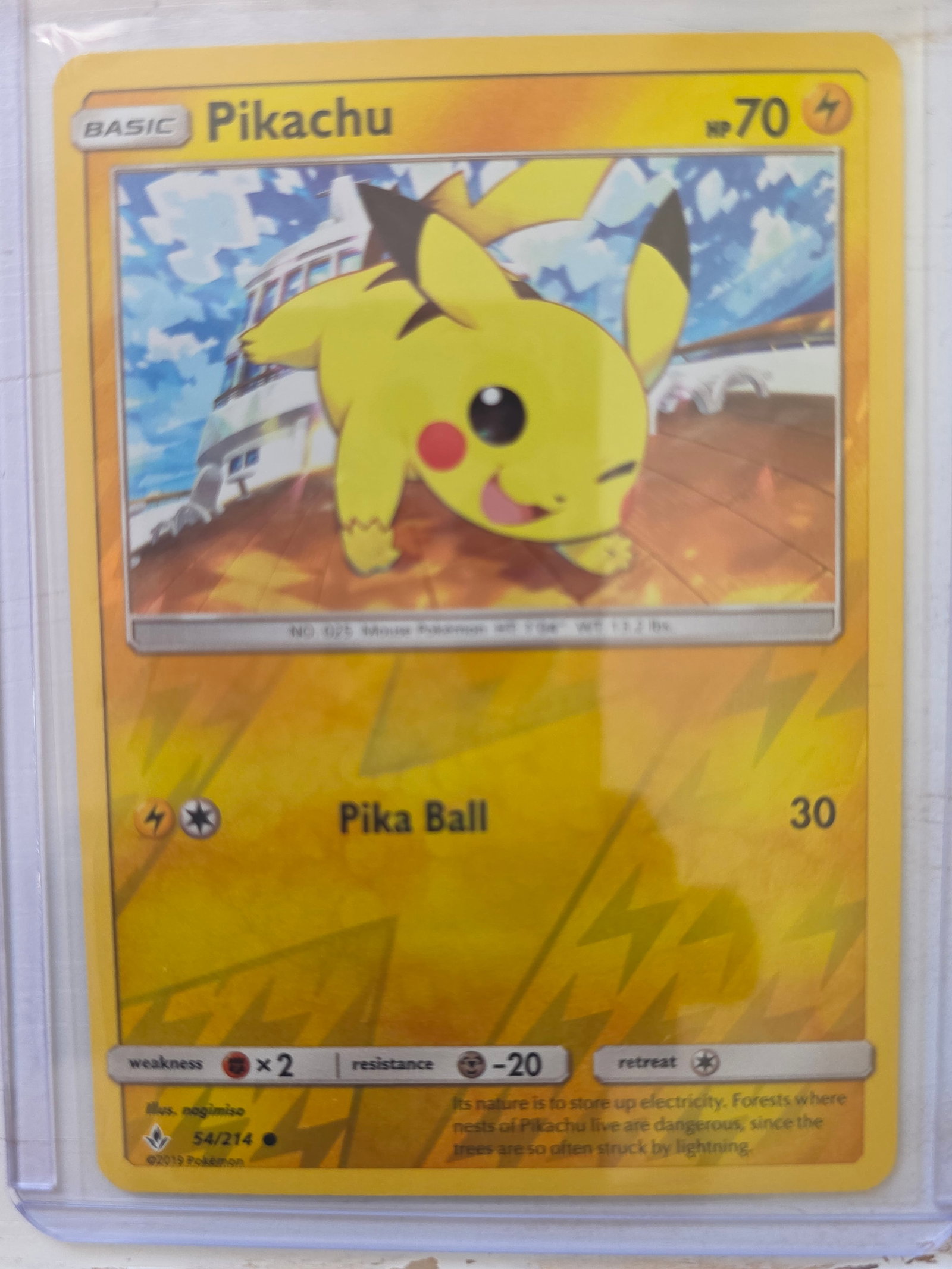 2019 Pikachu Sun and Moon 54/214 Non Holo: 2019 Pikachu Basic card 54/214 from Sun and Moon Unbroken Bonds. 70 HP Lightning type. Pika Ball 30. Non holo card. Preowned and stored in penny sleeve and top loader. Sold as shown.