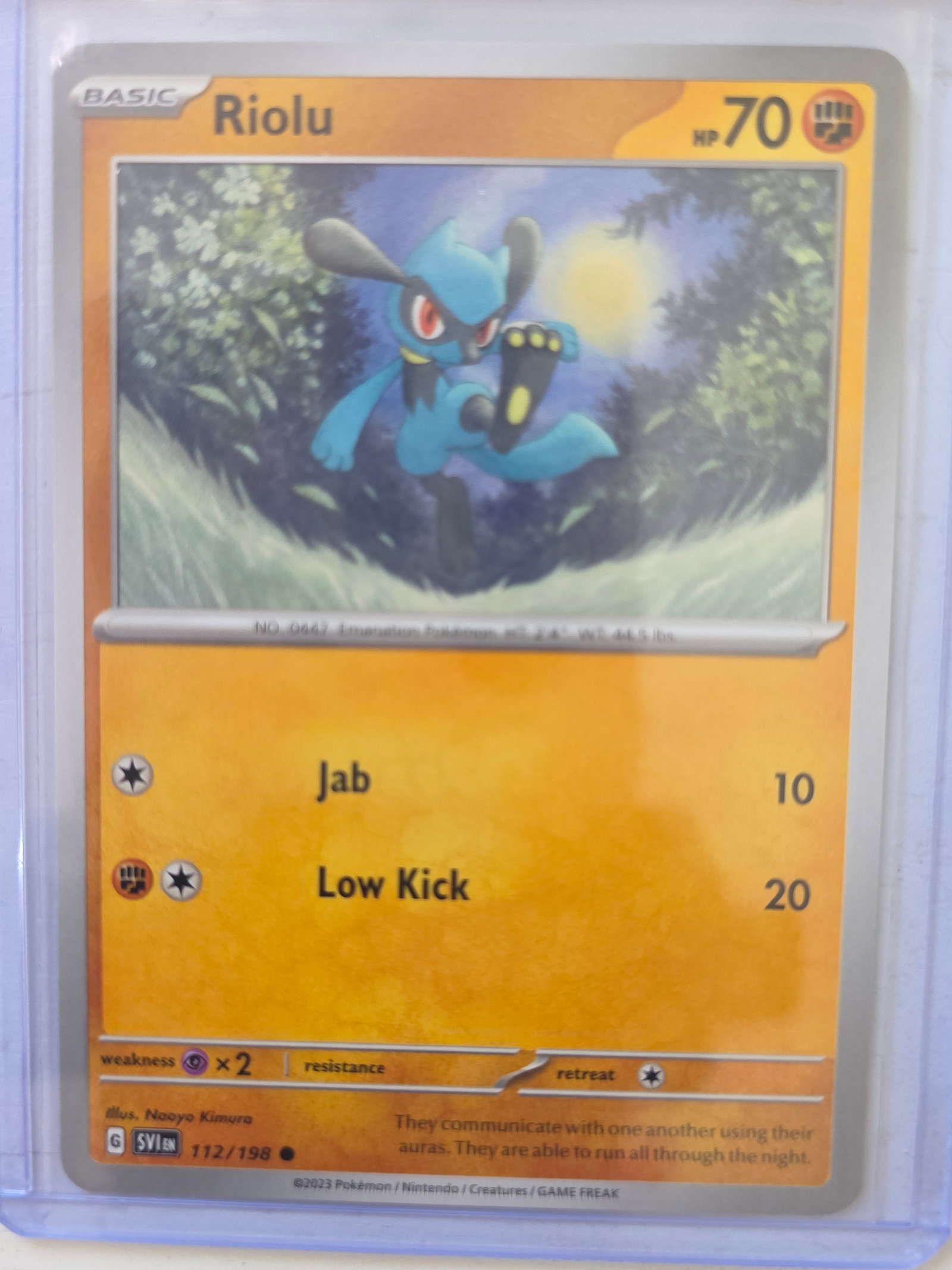 2023 Scarlet & Violet Riolu 112/198 Common Pokemon TCG Card Nintendo: 2023 Riolu Pokemon TCG trading card from the Scarlet & Violet base set, card number 112/198. Official Nintendo Pokemon trading card produced by Pokemon, Nintendo, Creatures, and GAME FREAK. Preowned c