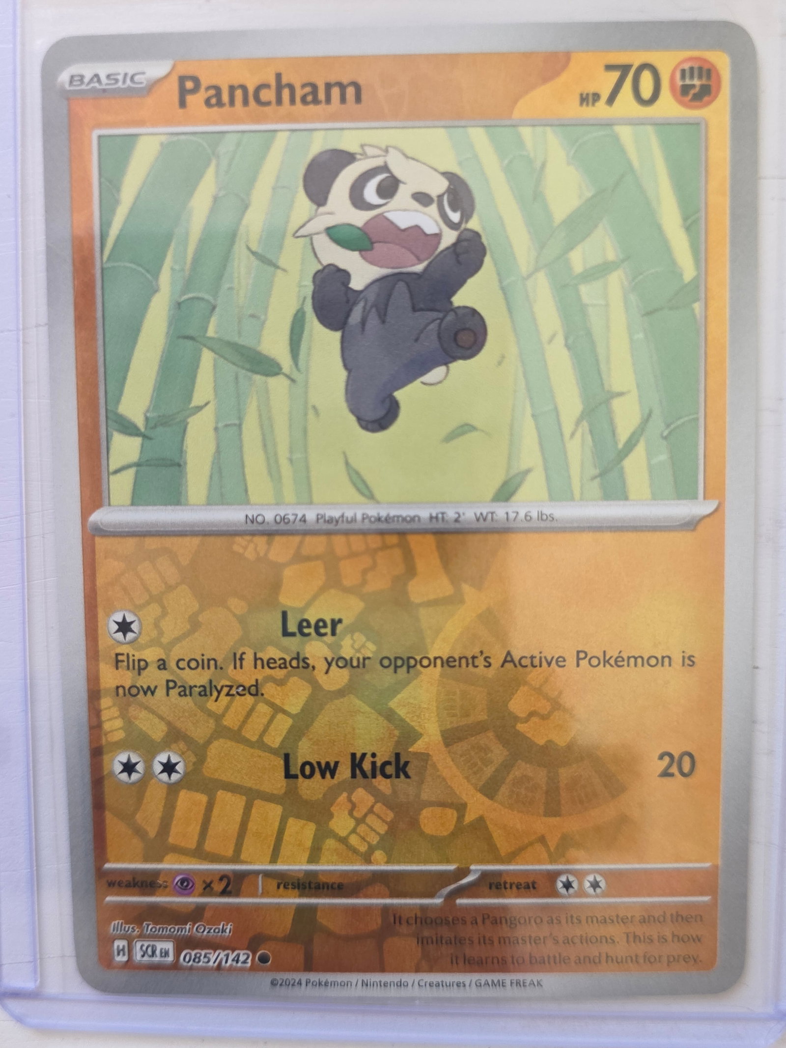 2024 Pancham Stellar Crown 085/142 Reverse Holo Pokemon Card: 2024 Pokemon Pancham reverse holo card number 085/142 from the Scarlet & Violet Stellar Crown set. This card is preowned and has been stored in a penny sleeve and top loader. Please review photos care