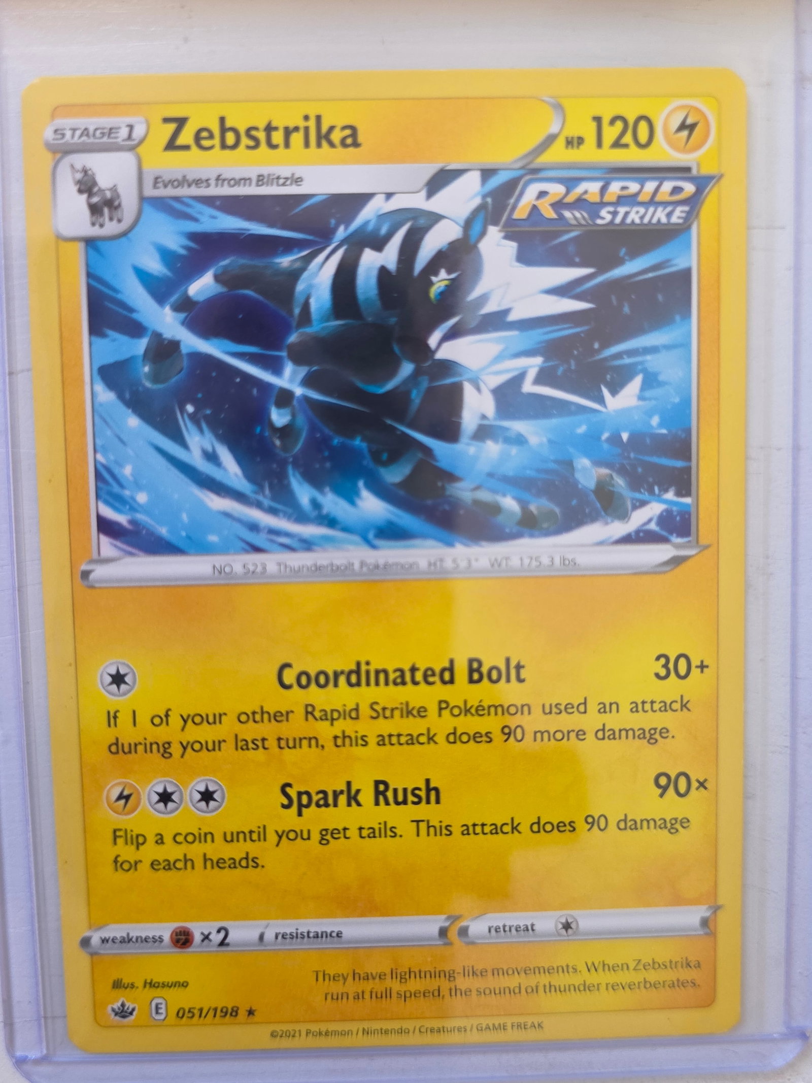 2021 Zebstrika Chilling Reign 051/198 Rare Pokemon Card: 2021 Pokemon Zebstrika card numbered 051/198 from the Sword & Shield Chilling Reign expansion set. Illustrated by Hasuno. Rapid Strike Stage 1 Electric-type Pokemon evolving from Blitzle. Card stored