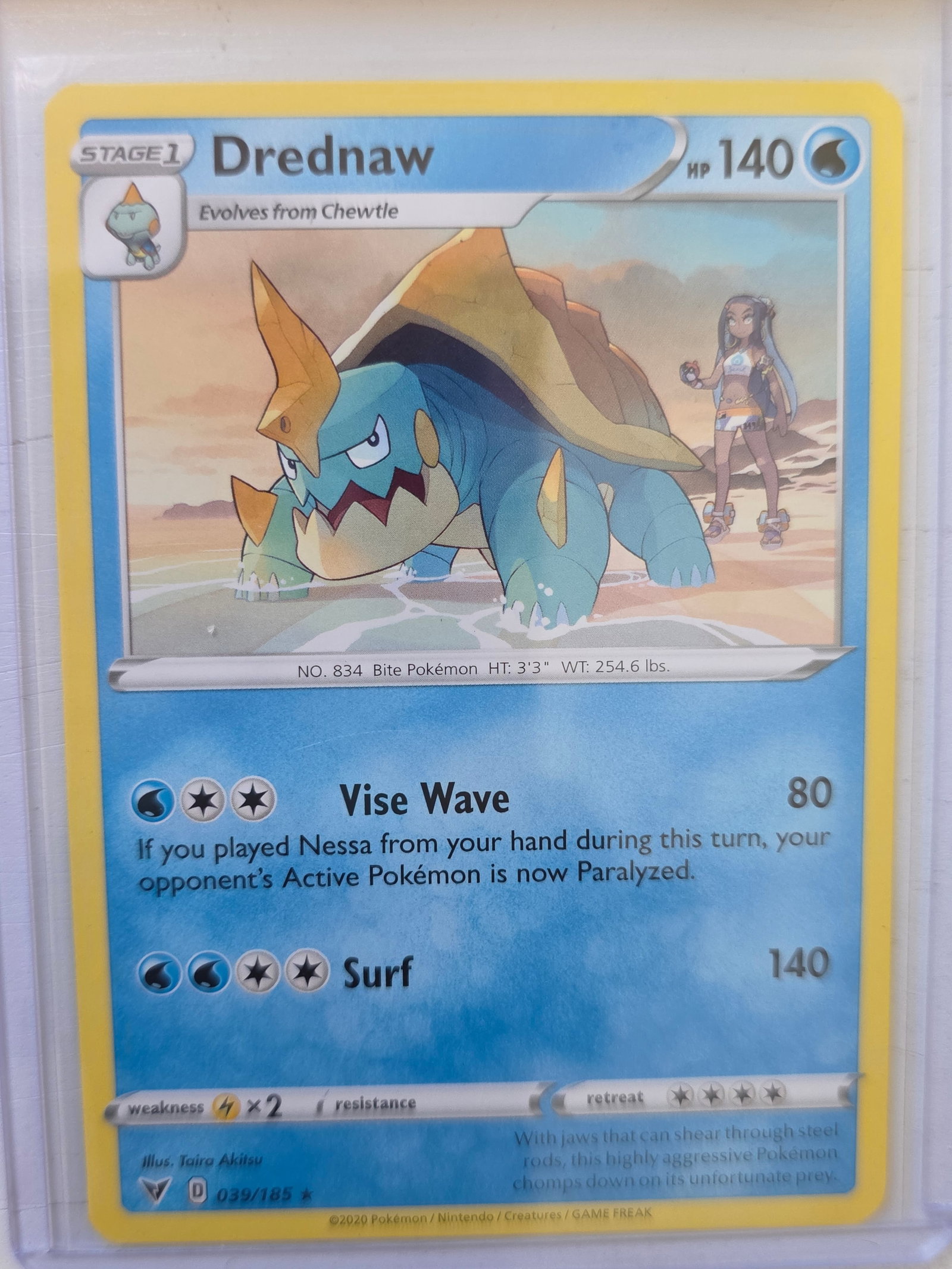 2020 Drednaw Vivid Voltage 039/185 Rare Pokemon Card: 2020 Pokemon Drednaw card numbered 039/185 from the Sword & Shield Vivid Voltage expansion set. Illustrated by Taira Akitsu. Stage 1 Water type Pokemon evolving from Chewtle featuring the attacks Vise