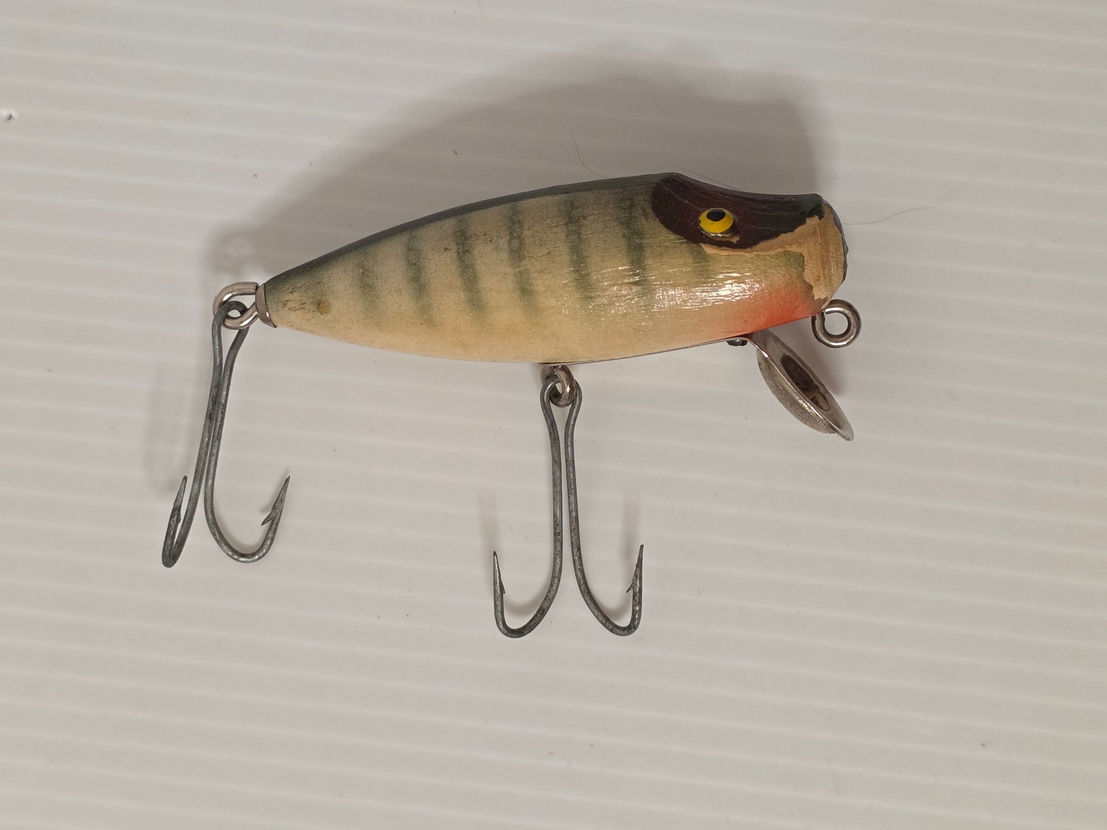 Vintage Heddon River Runt Spook Scale Finish Fishing Lure: Vintage Heddon River Runt Spook sinking fishing lure, one of the most iconic early crankbait designs introduced in 1933. This example features a classic scale pattern finish with vertical striping, a