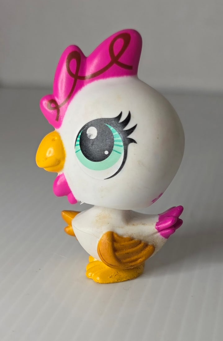 GEN 4 Chicken #3338 White Pink Yellow Green Eyes Hasbro: This is an authentic Hasbro Littlest Pet Shop chicken #3338 from the later generation releases around 2013. This figure features a white body with a bright pink comb and tail feathers, yellow beak and