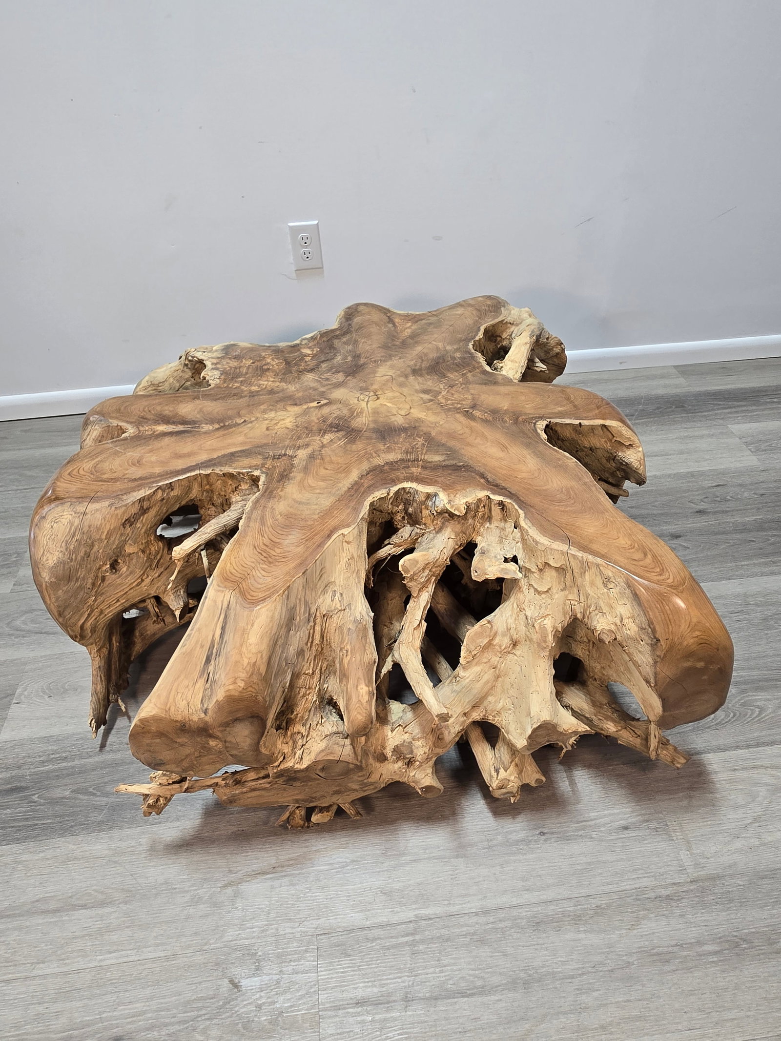 Teak Root Coffee Table: Large Square Teak Root Coffee TableThis 100% natural root table was handcrafted in Java, Indonesia using sustainably harvested teak wood.This table is brand new.Length: 40"Width: 40"Height: 18"Please