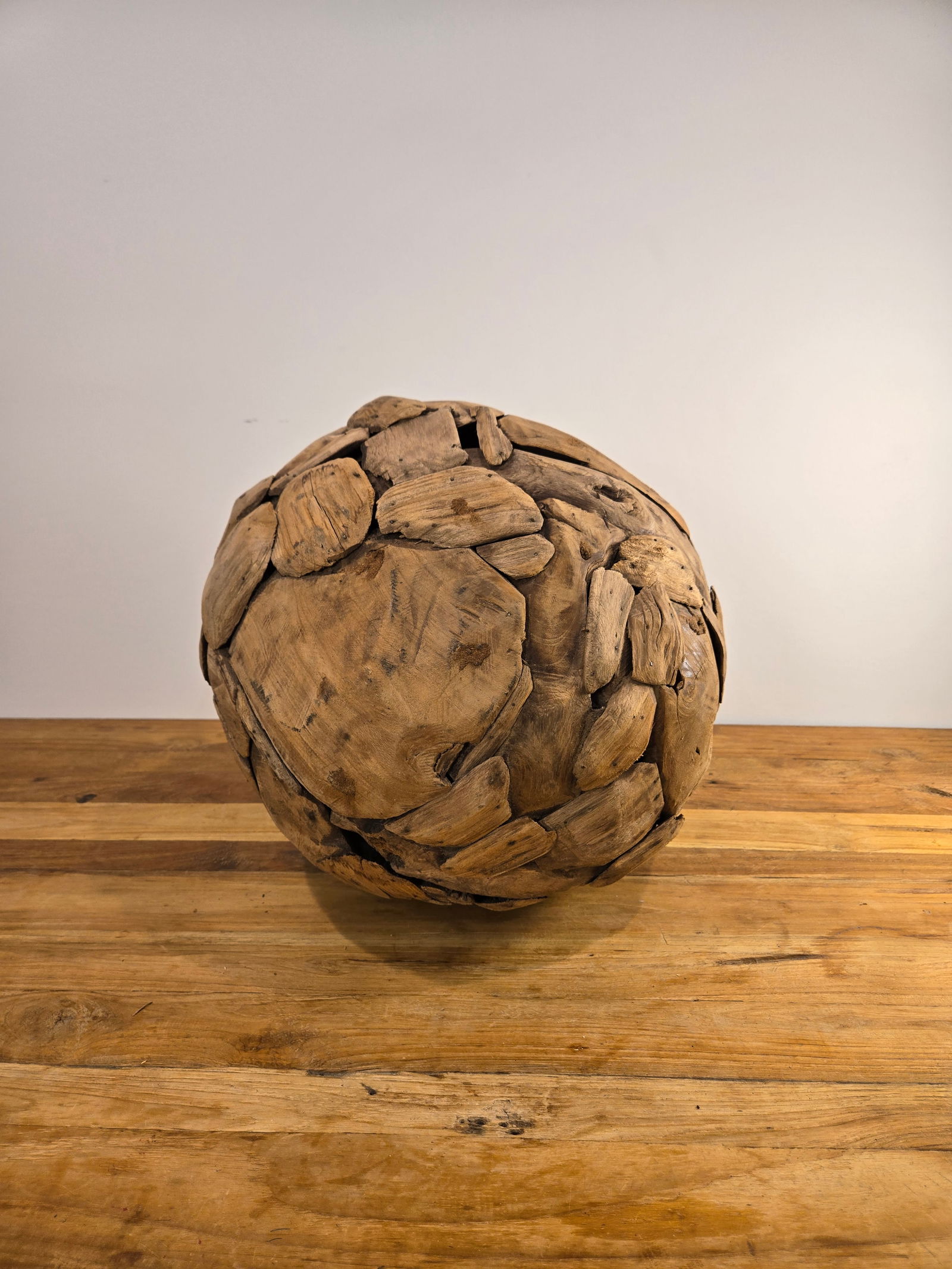 Large Teak Wood Ball: Large Teak Wood BallHand-crafted from 100% natural, sustainably harvested Indonesian teak wood.Brand new condition.Diameter: 15.5?Please feel free to reach out with any questions.Thank you.