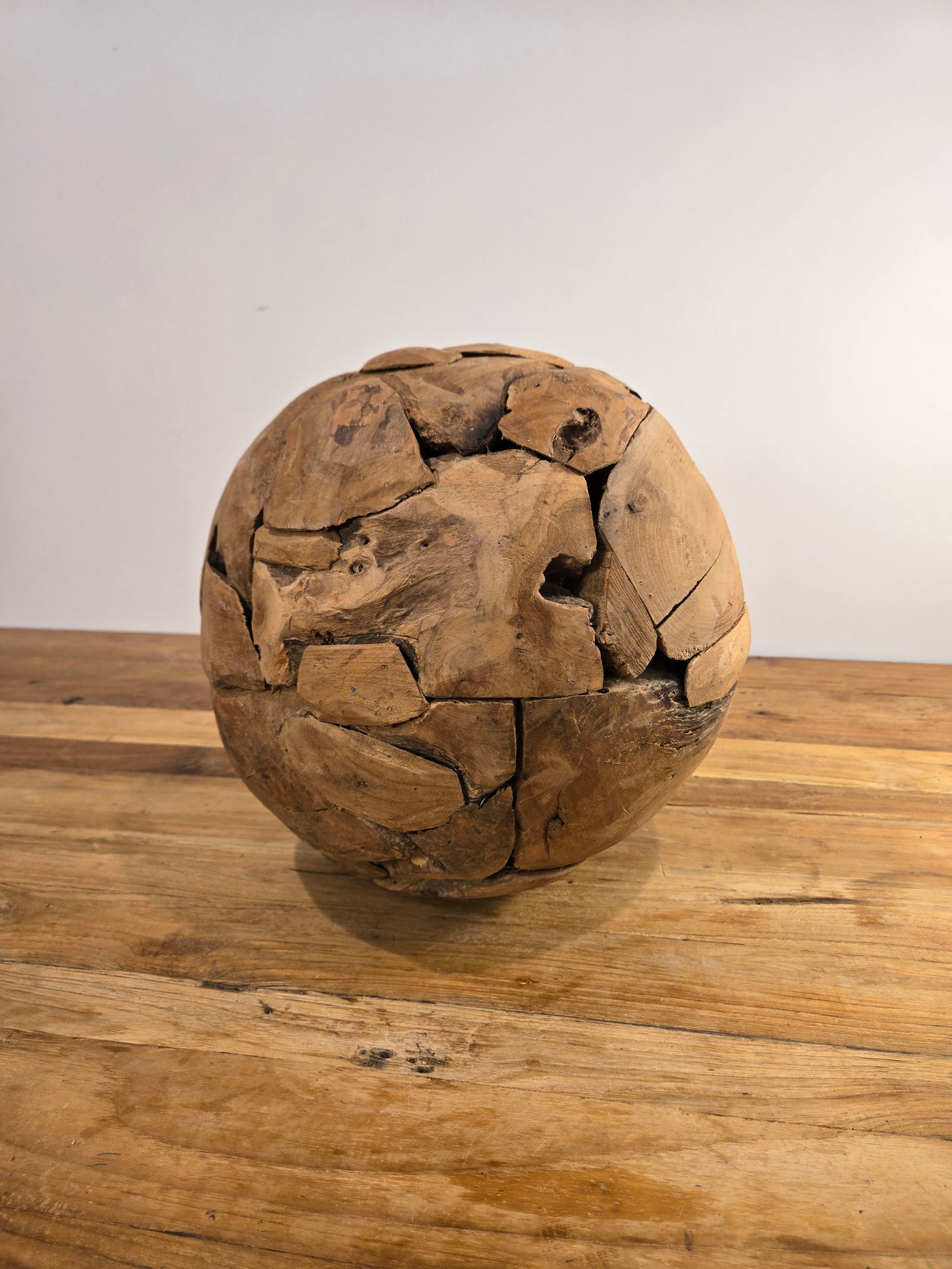 Medium Teak Wood Ball: Medium Teak Wood BallHand-crafted from 100% natural, sustainably harvested Indonesian teak wood.Brand new condition.Diameter: 12?Please feel free to reach out with any questions.Thank you.